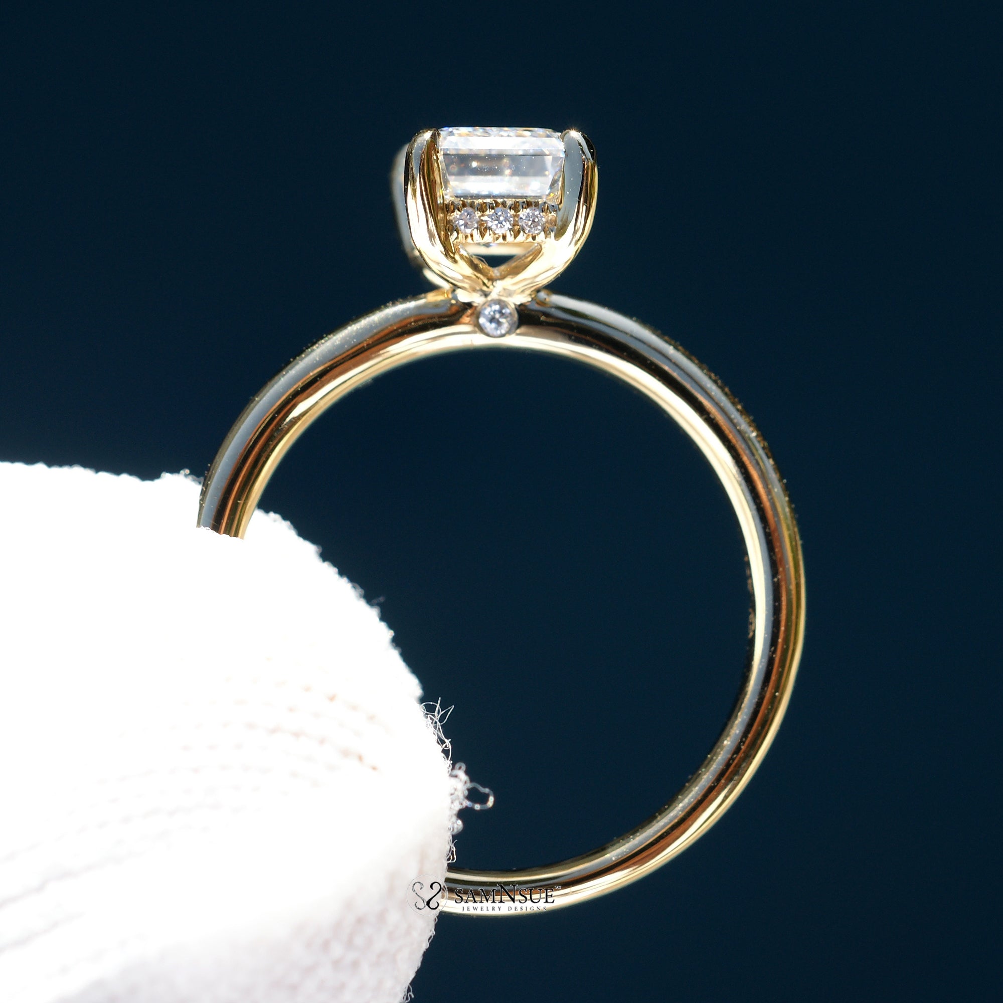 Emerald cut diamond solitaire engagement ring in yellow gold 1.5ct