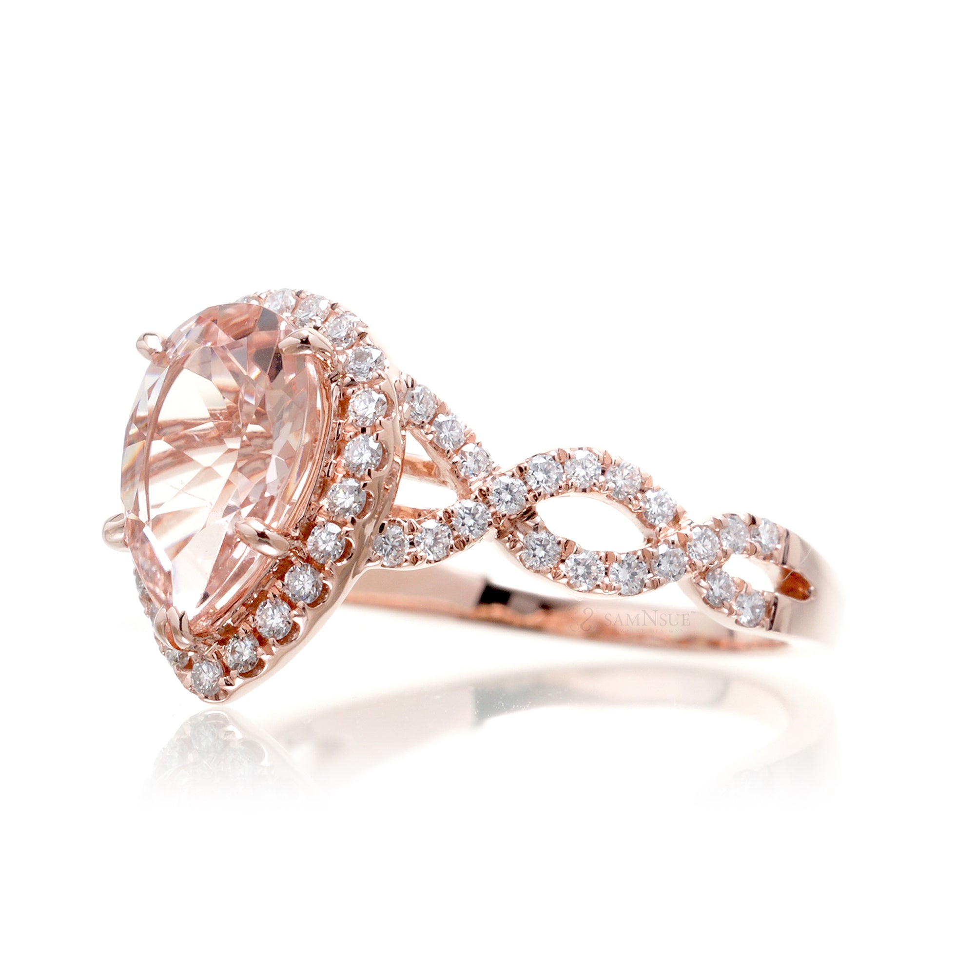 Pear morganite engagement ring rose gold diamond halo twist band