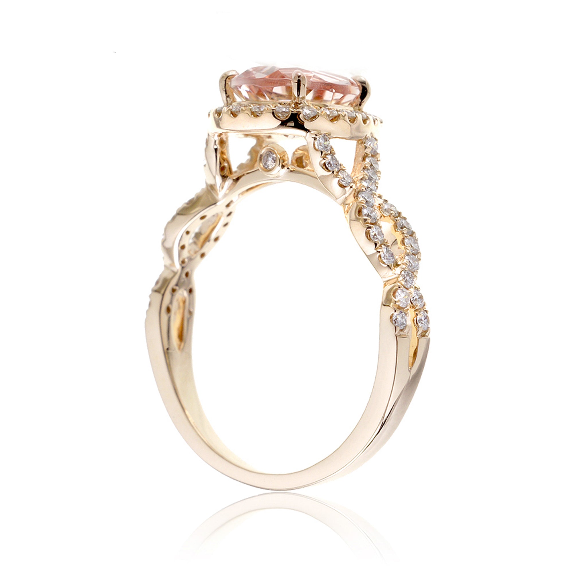 Pear morganite engagement ring yellow gold diamond halo twist band