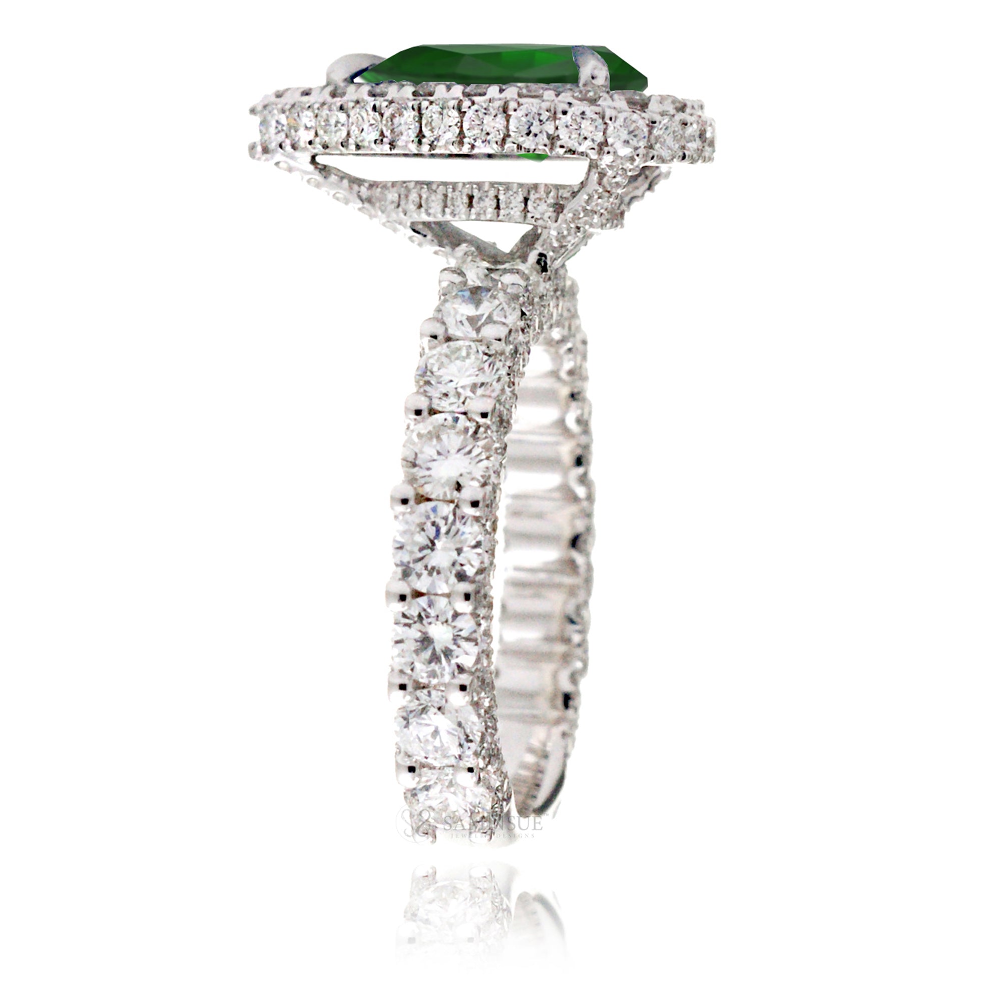 Pear emerald with U prongs diamond halo and band hidden halo in white gold