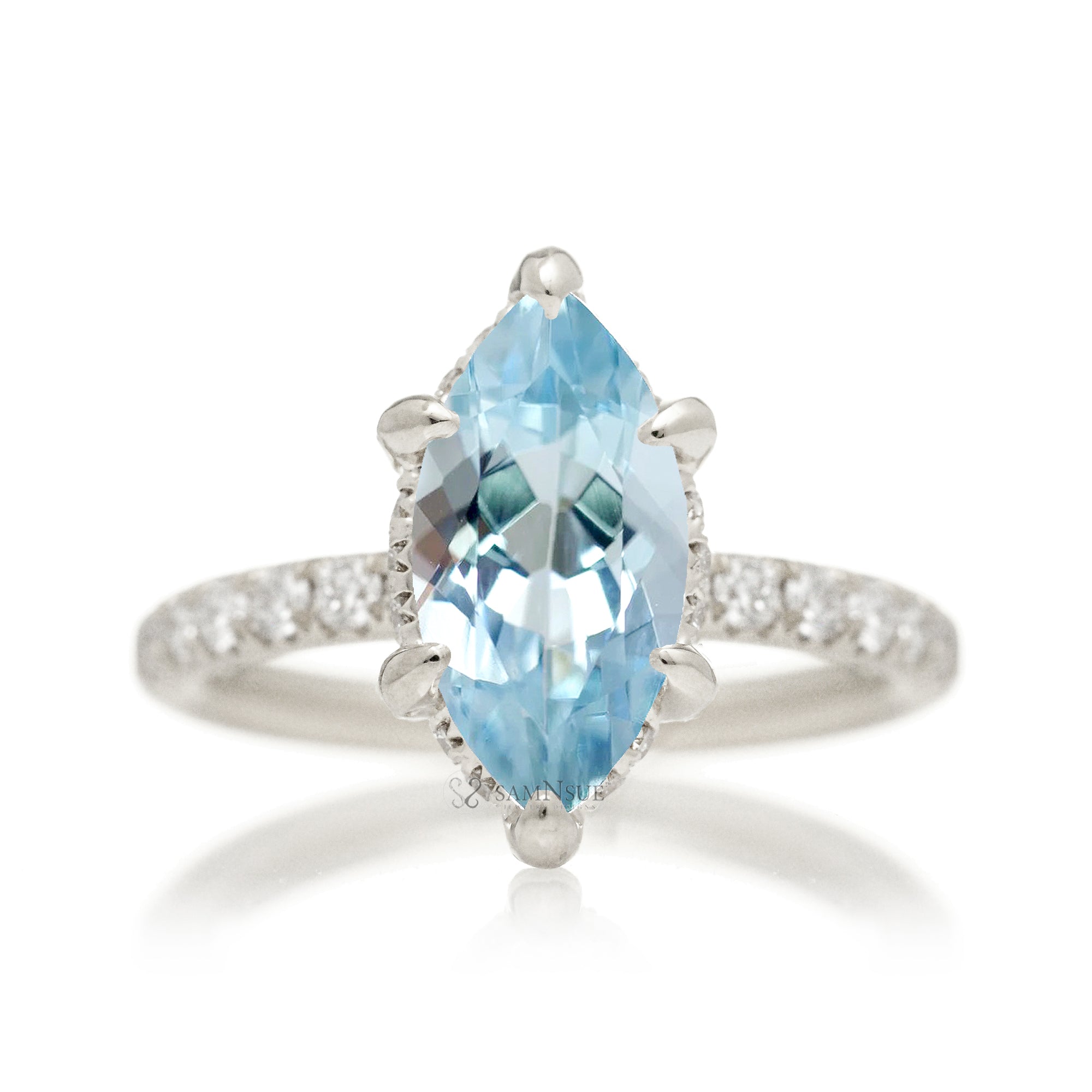Marquise aquamarine ring with hidden halo and rounded diamond band comfort fit white gold