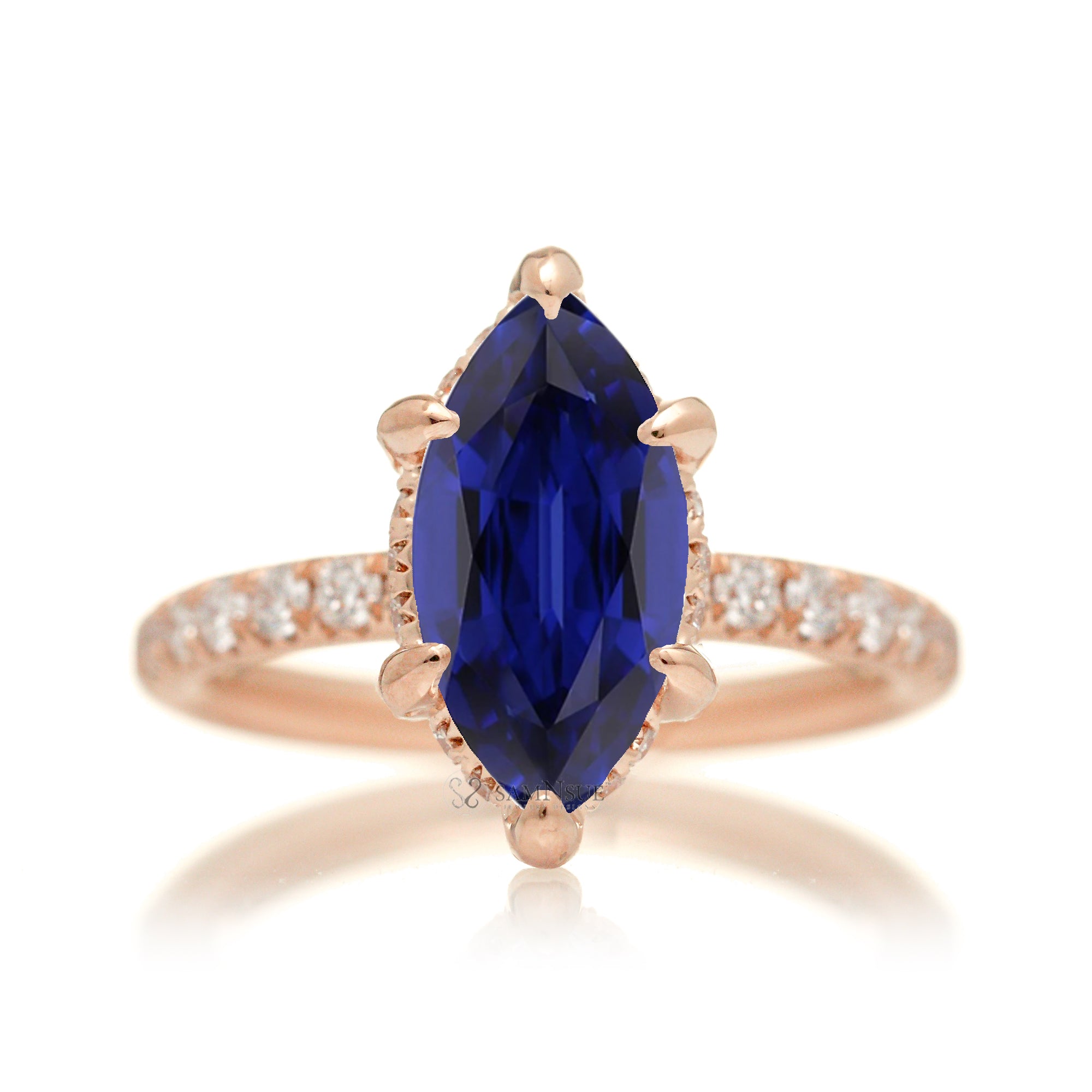 Marquise cut blue sapphire engagement ring with hidden halo and rounded diamond band for a comfort fit rose gold