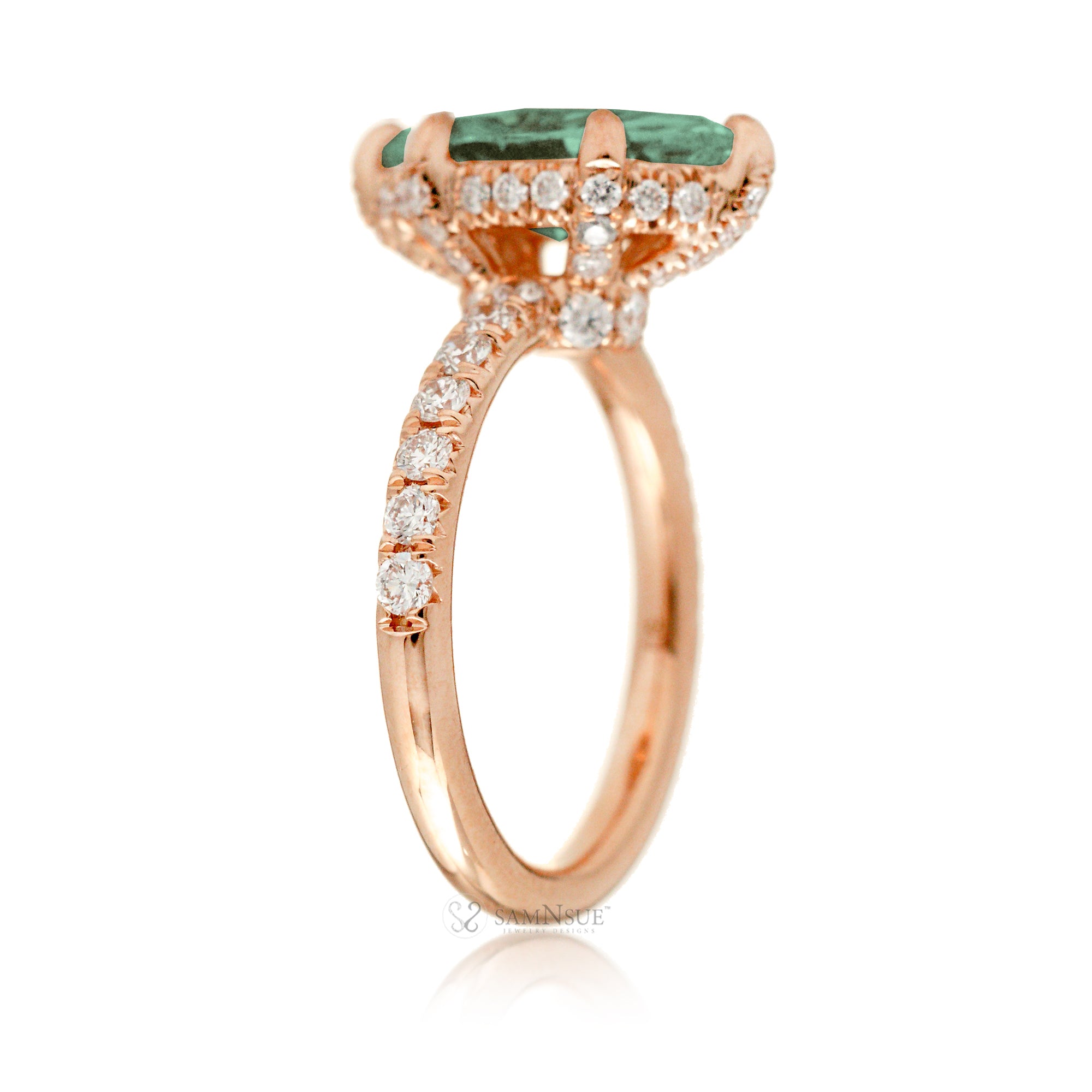 Green sapphire engagement ring with marquise and hidden diamond halo band in rose gold