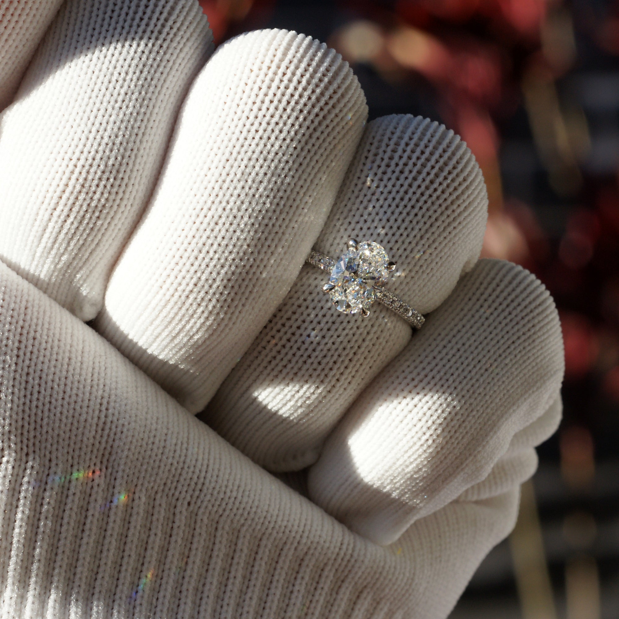 Oval diamond engagement ring in platinum with 1.5 carat center stone and 1.8mm diamond band