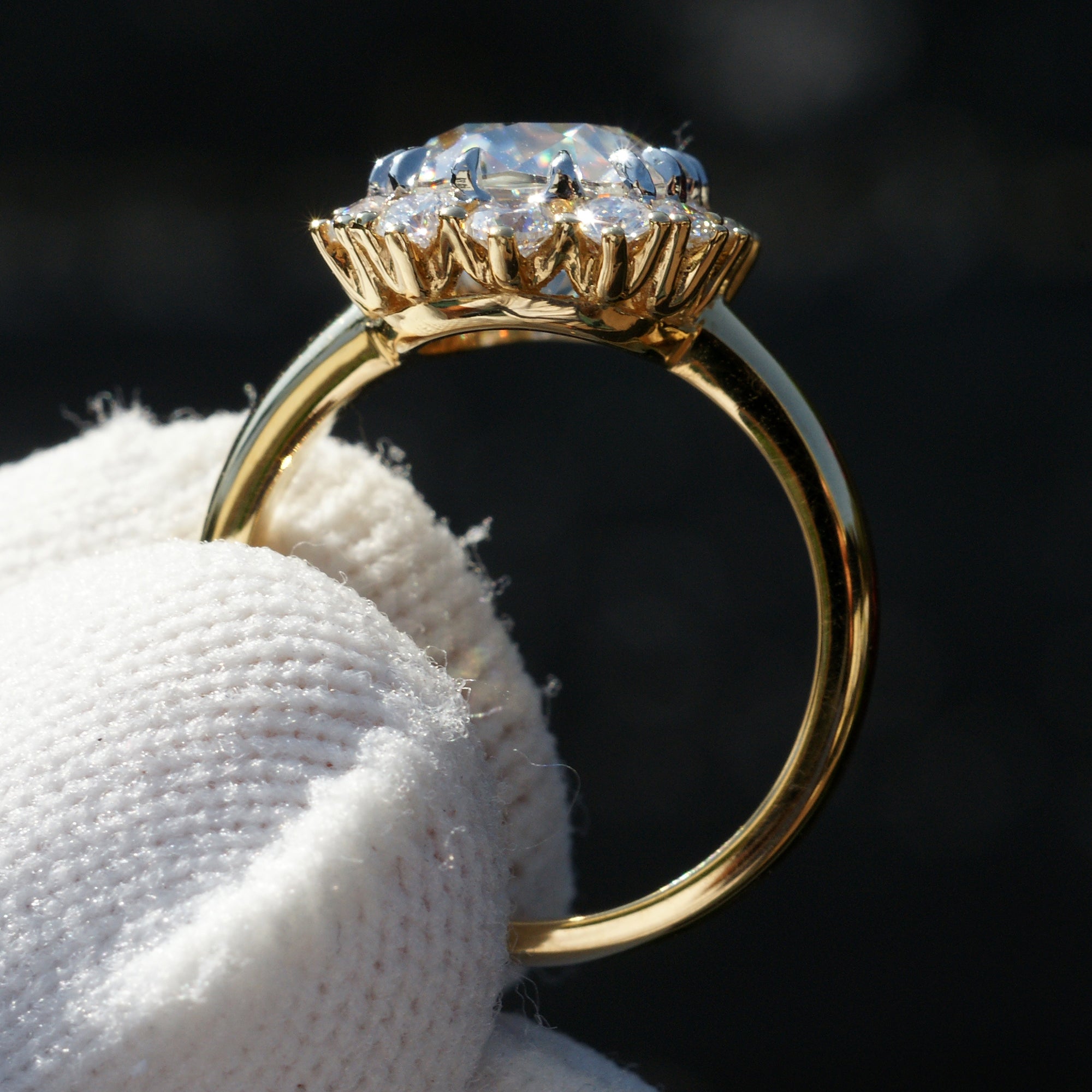 Vintage style cushion moissanite diamond halo ring in yellow gold claw prongs