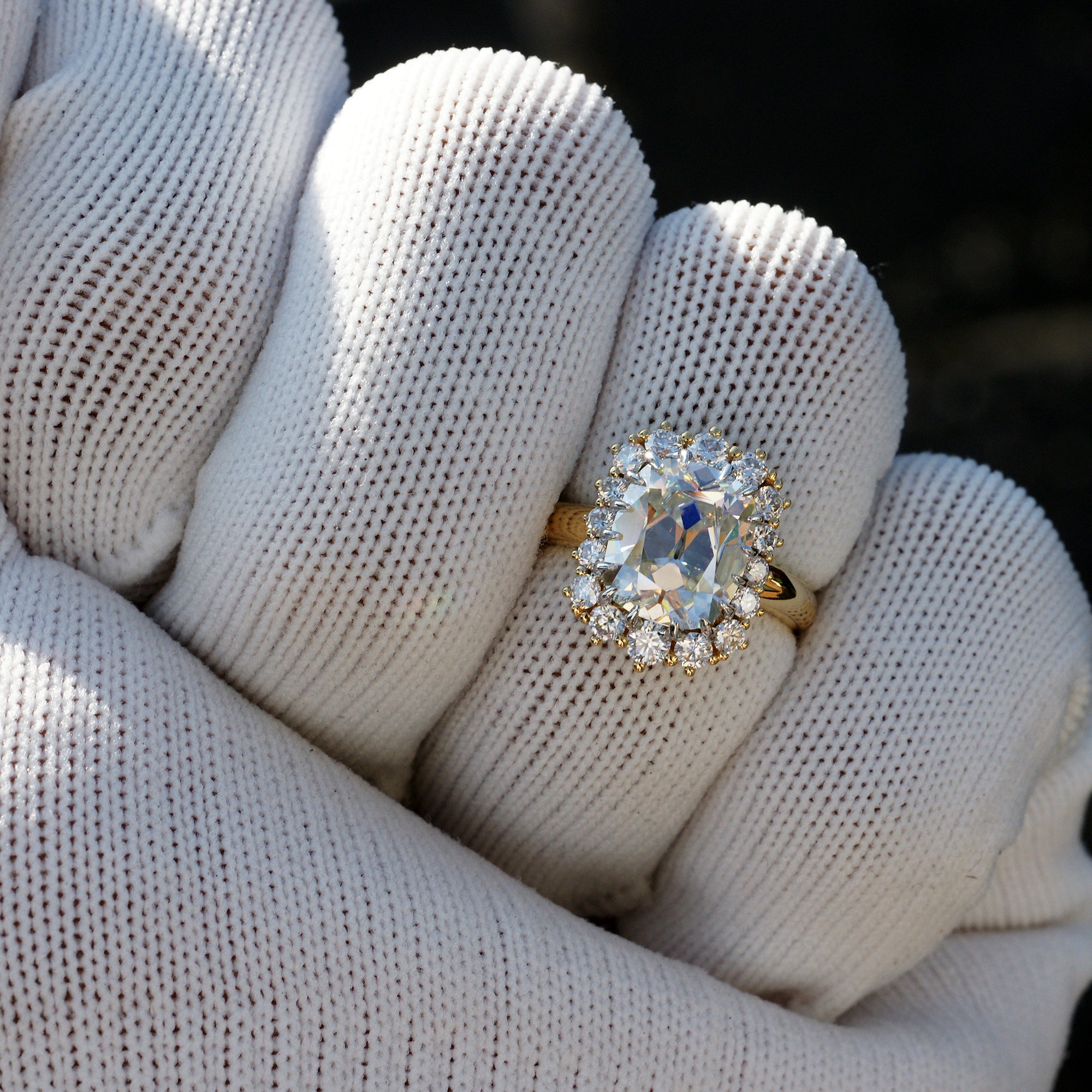 Vintage style cushion moissanite diamond halo ring in yellow gold claw prongs