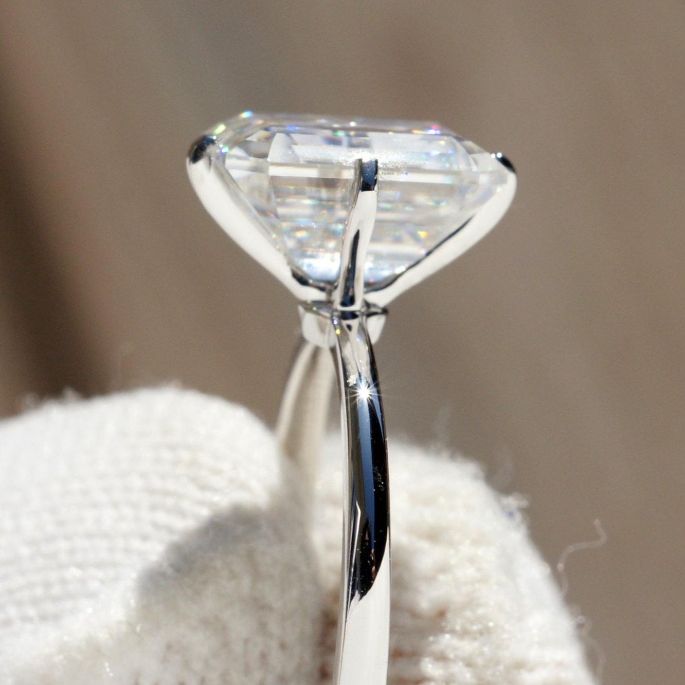 The Adeline Emerald Cut Moissanite 9x7mm 18k white gold