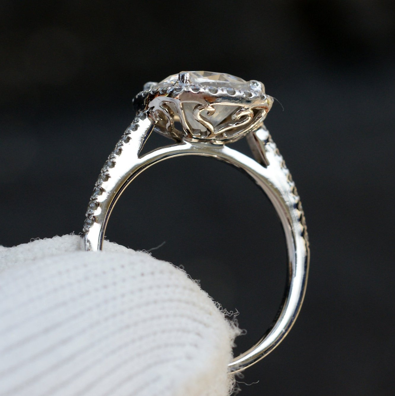 Cushion cut moissanite ring with diamond halo in white gold