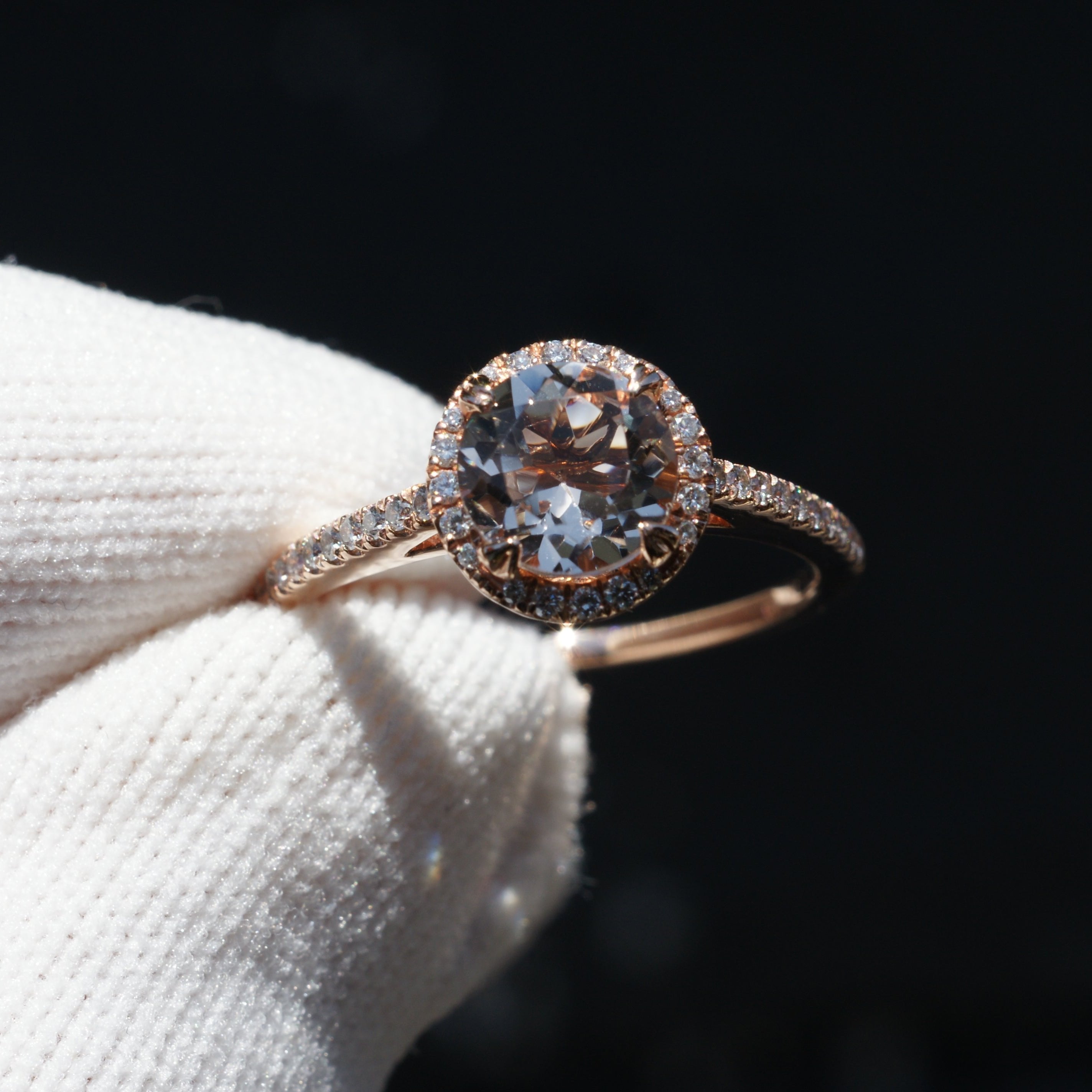 Round morganite engagement ring with diamond halo in rose gold