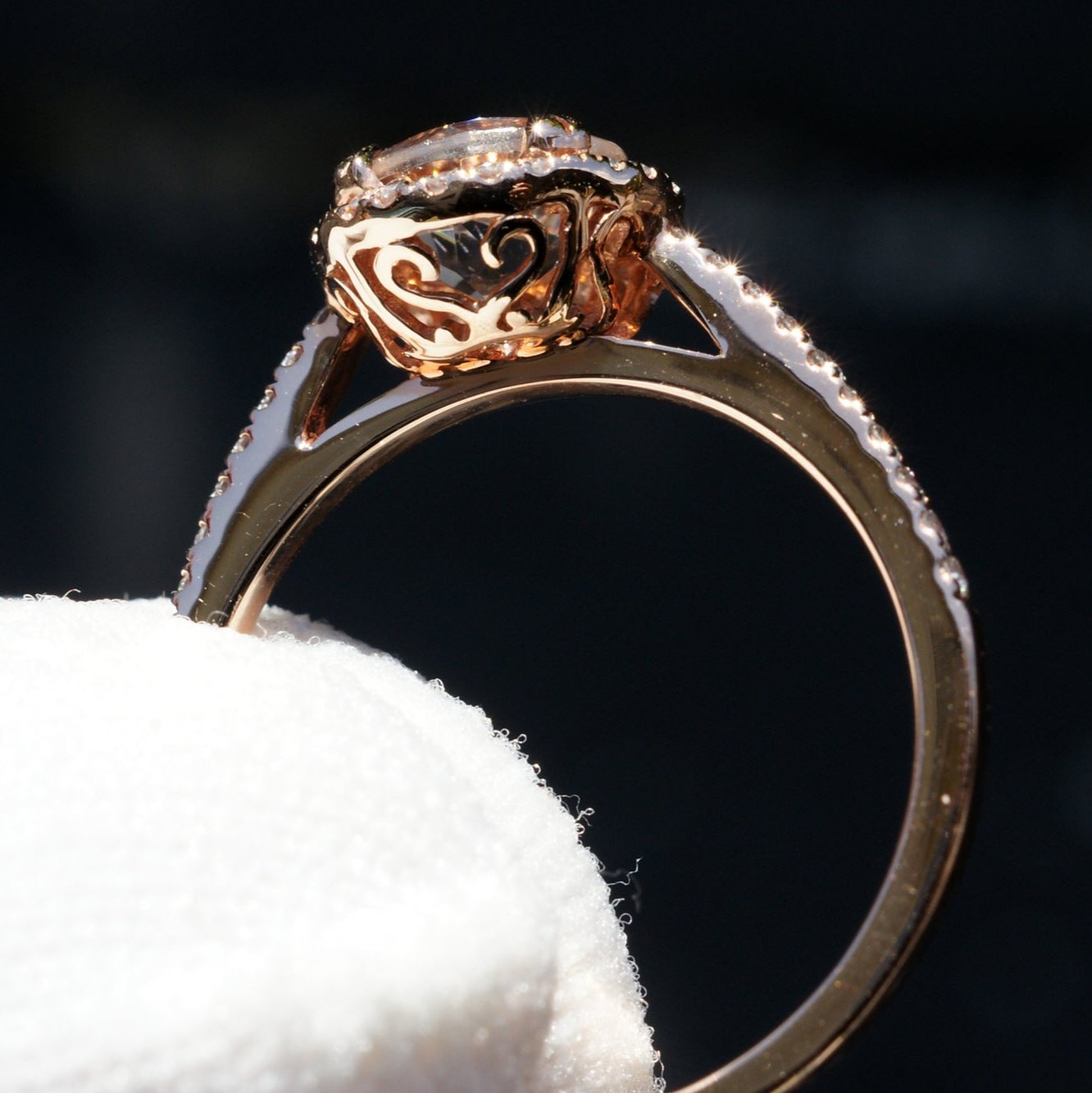 Round morganite engagement ring with diamond halo in rose gold