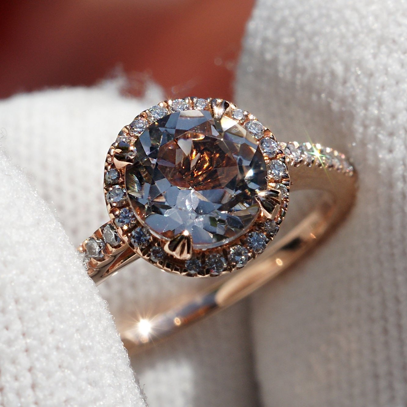 Round morganite engagement ring with diamond halo in rose gold