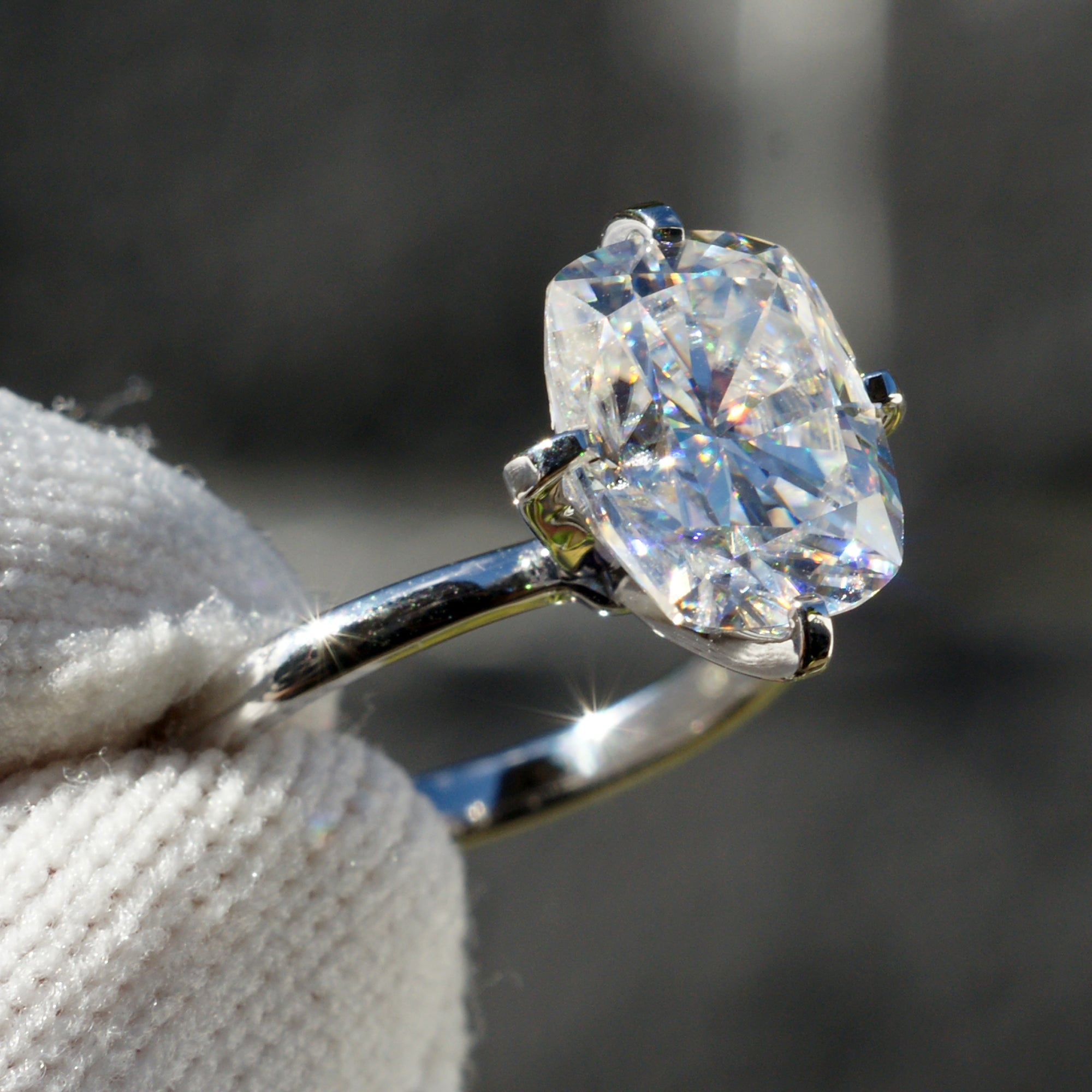 The Adeline Cushion Moissanite 10x8mm 18k white gold middle prongs