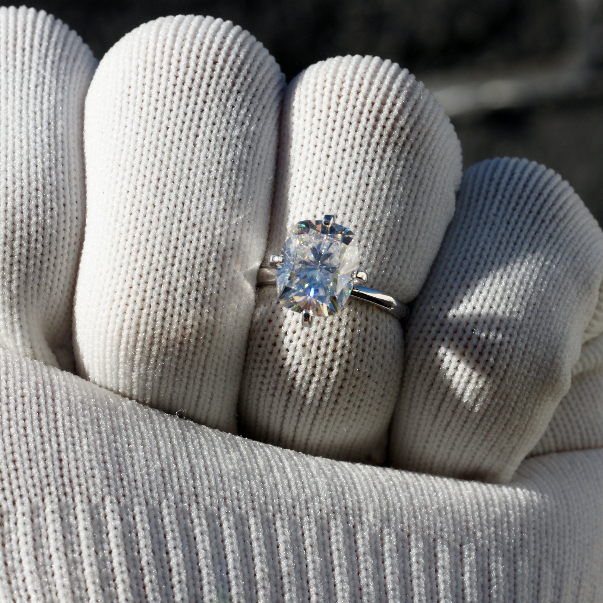 The Adeline Cushion Moissanite 10x8mm 18k white gold middle prongs