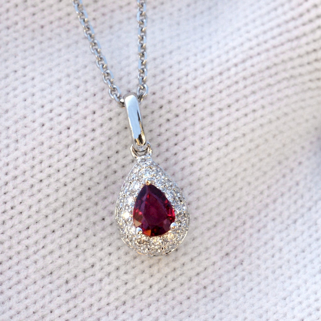 Pear cut ruby diamond solitaire necklace pendant with white gold chain