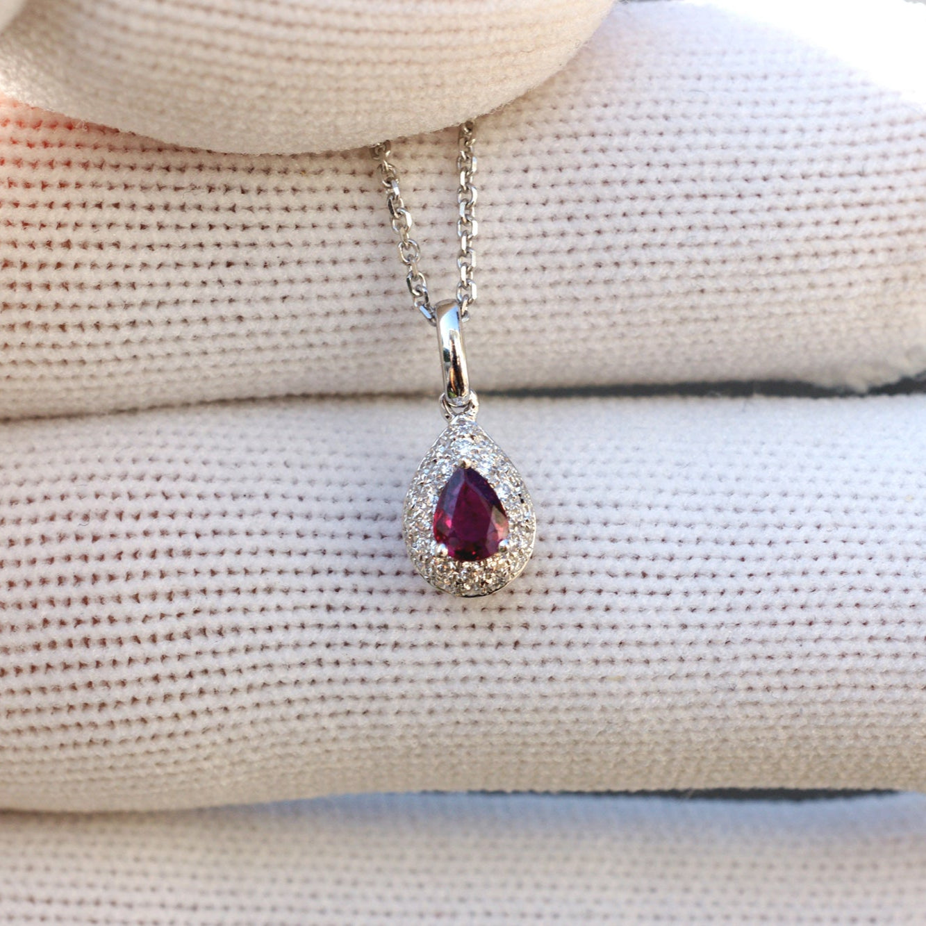 Pear cut ruby diamond solitaire necklace pendant with white gold chain