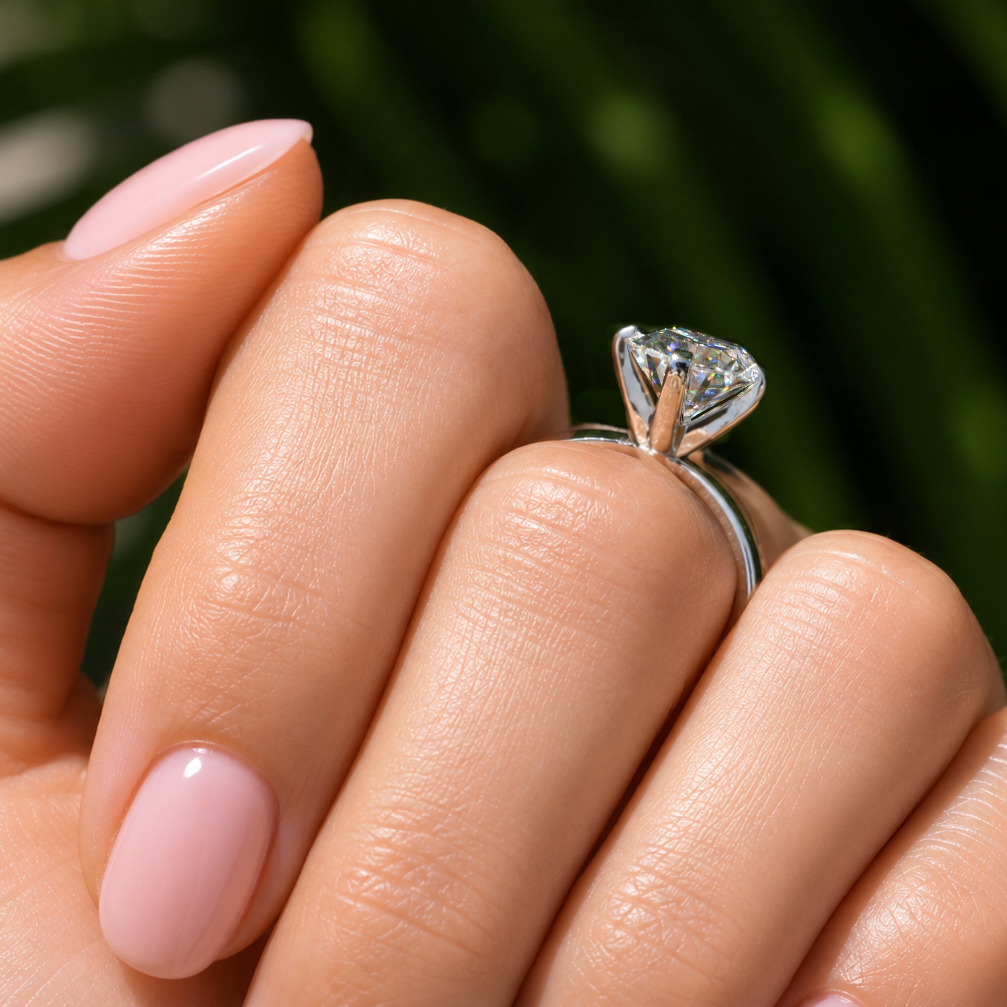 The Adeline Cushion Moissanite 10x8mm middle prongs