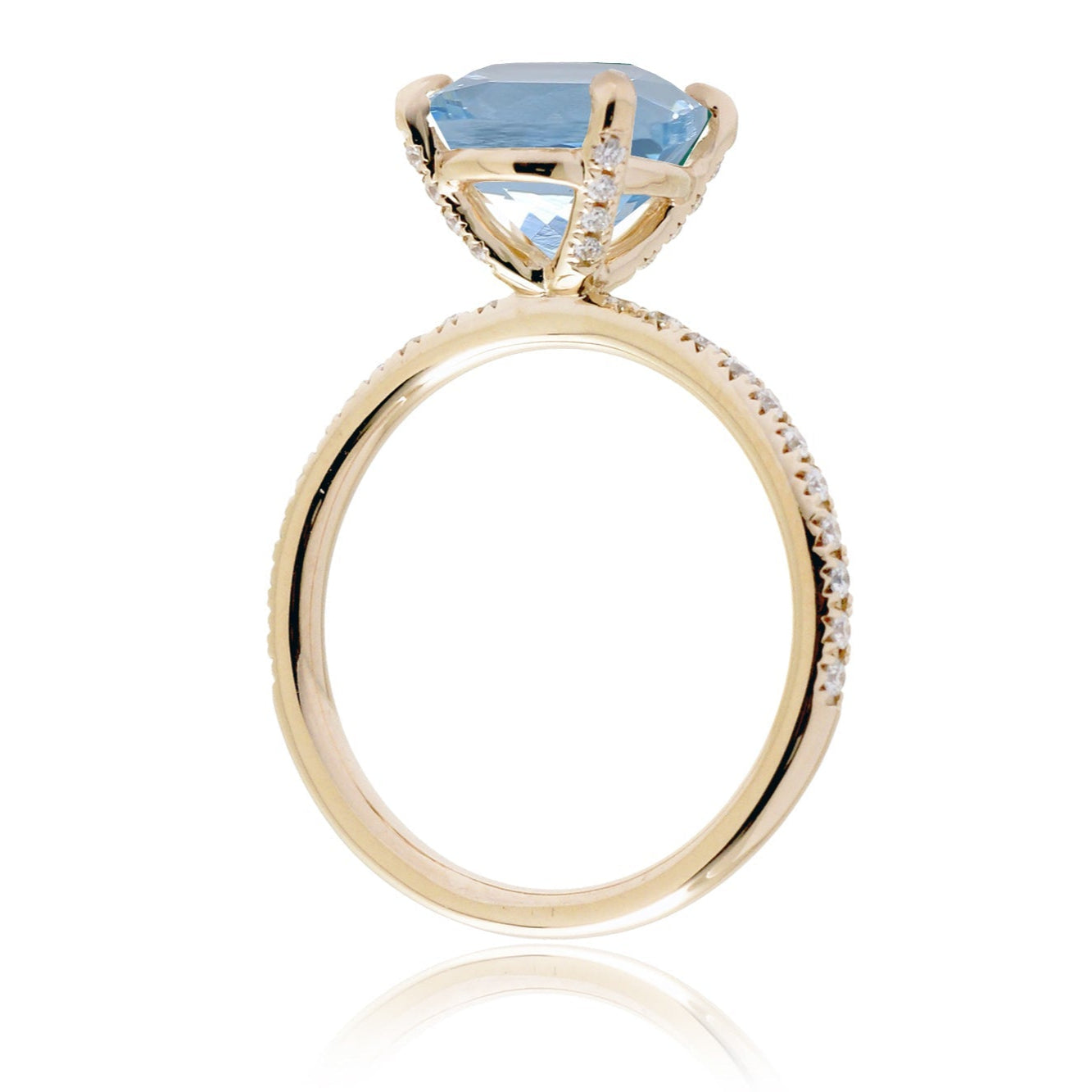 Round cut aquamarine diamond band engagement ring yellow gold with diamonds on prongs