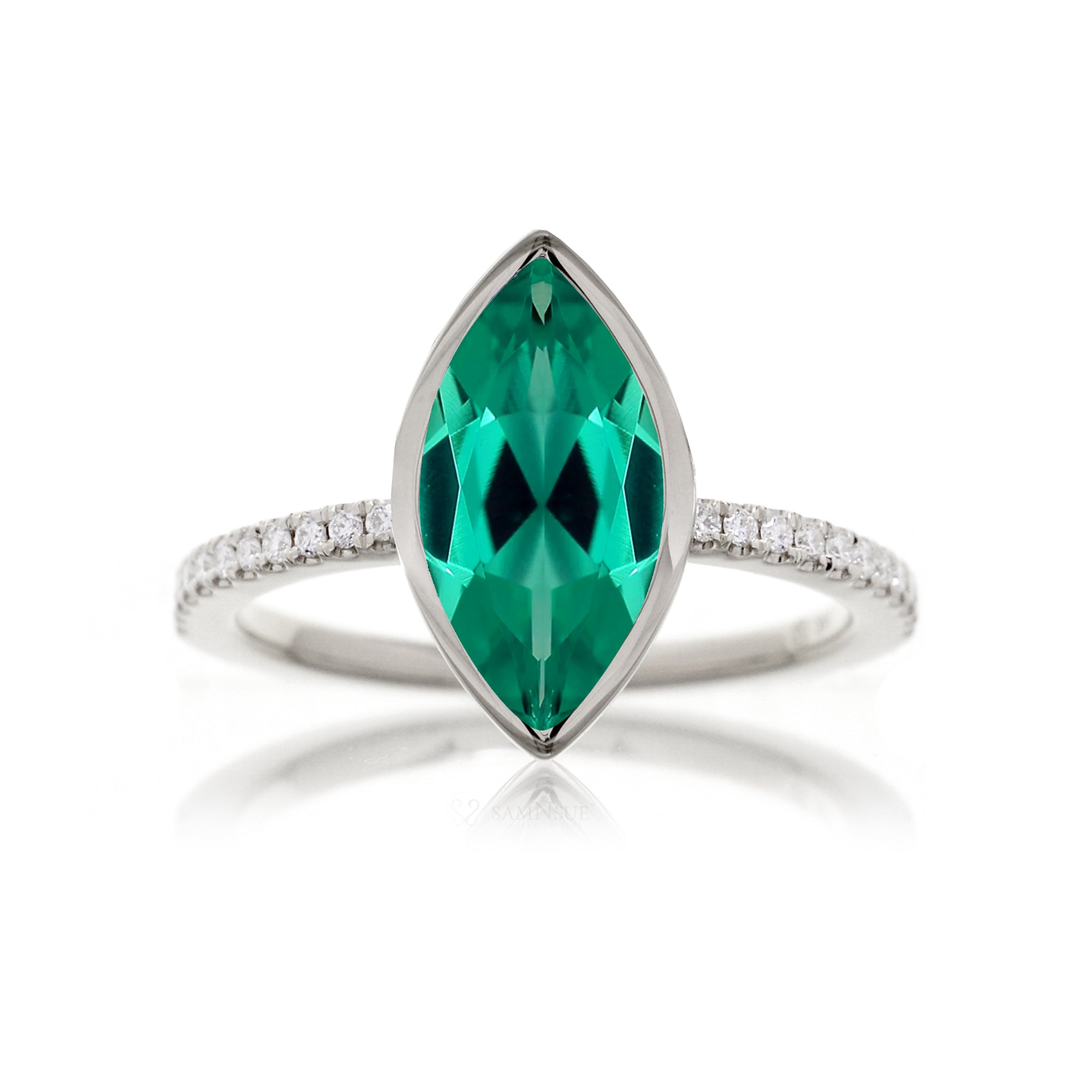 Marquise cut green emerald bezel solitaire diamond ring The Beverly white gold