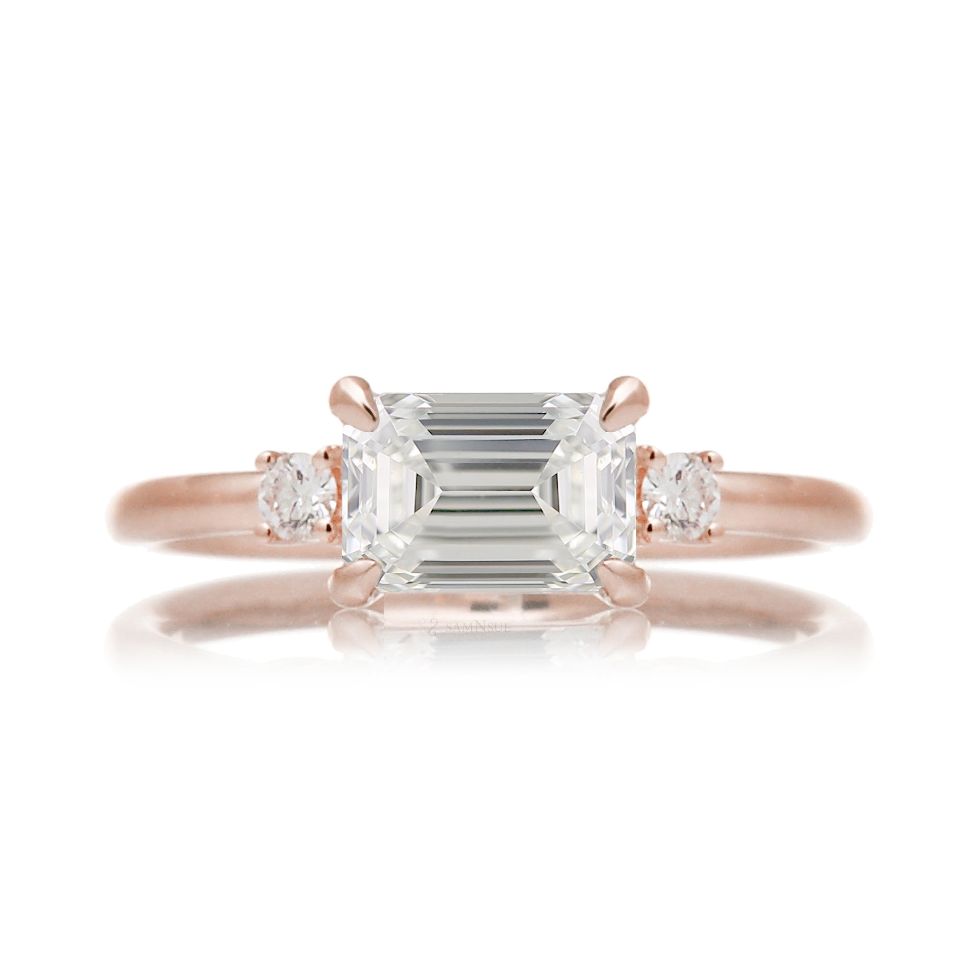 east-west emerald cut diamond three stone ring the Lena rose gold