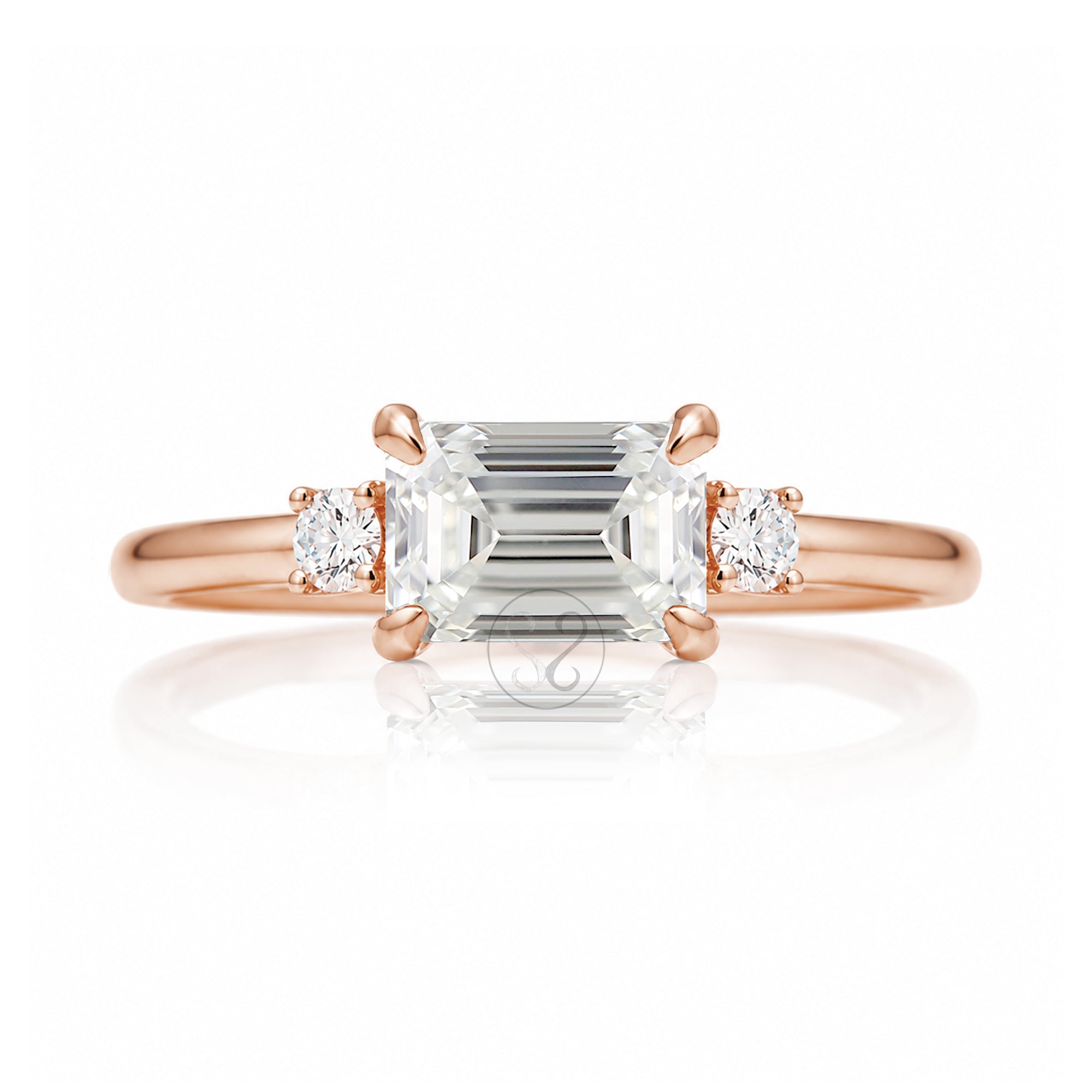 east-west emerald cut diamond three stone ring the Lena rose gold