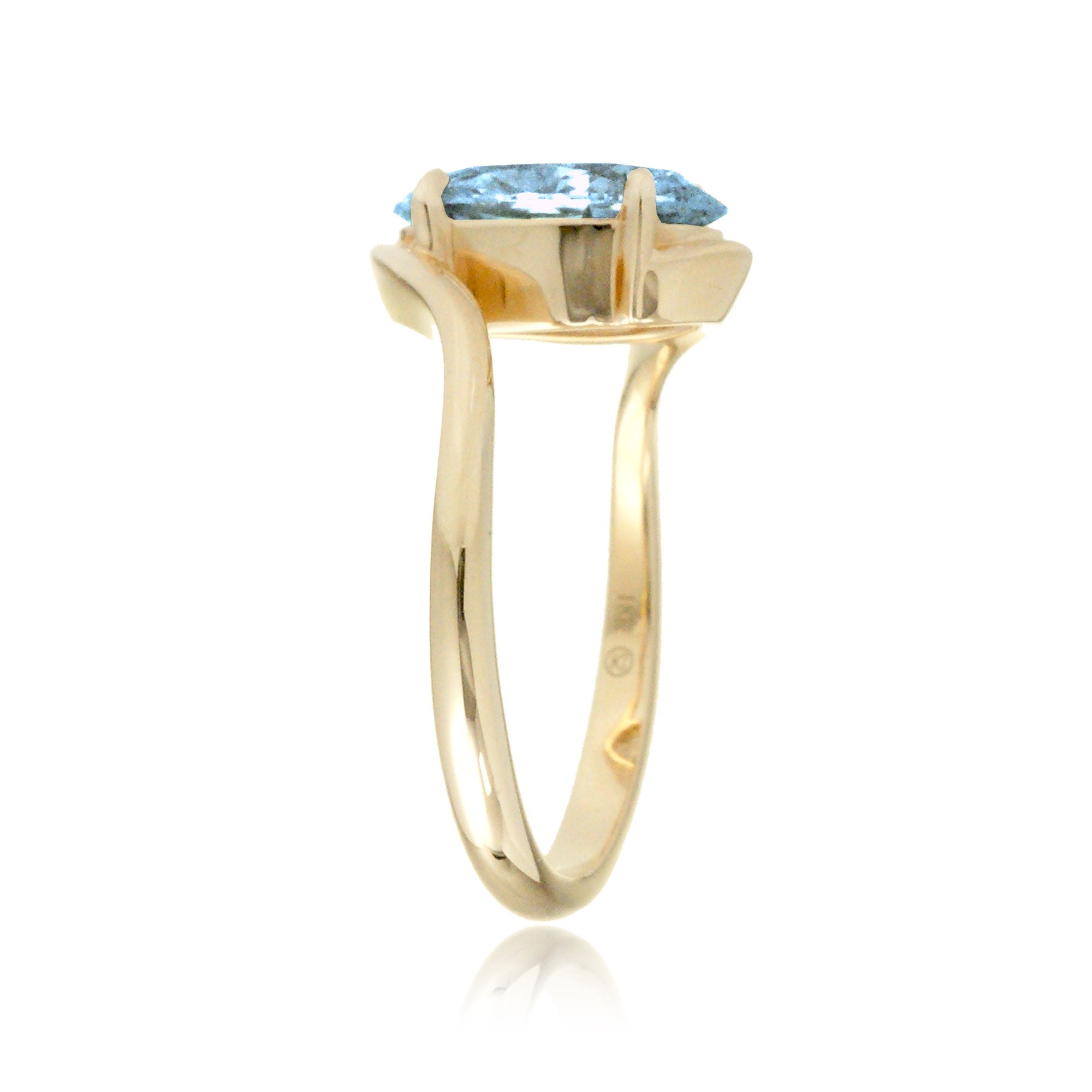 Oval cut aquamarine ring embraced wrap around yellow gold solitaire