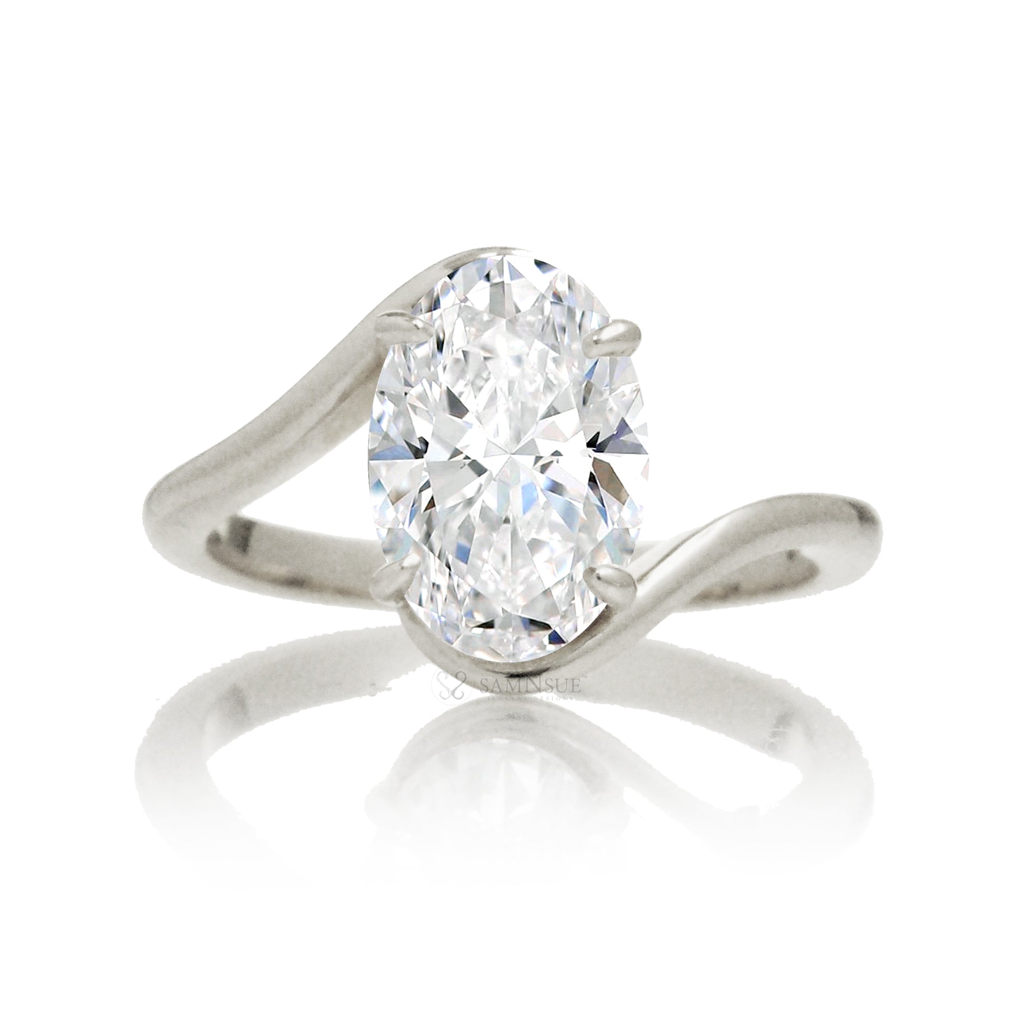 Oval diamond solitaire ring in a modern bypass setting with white gold band