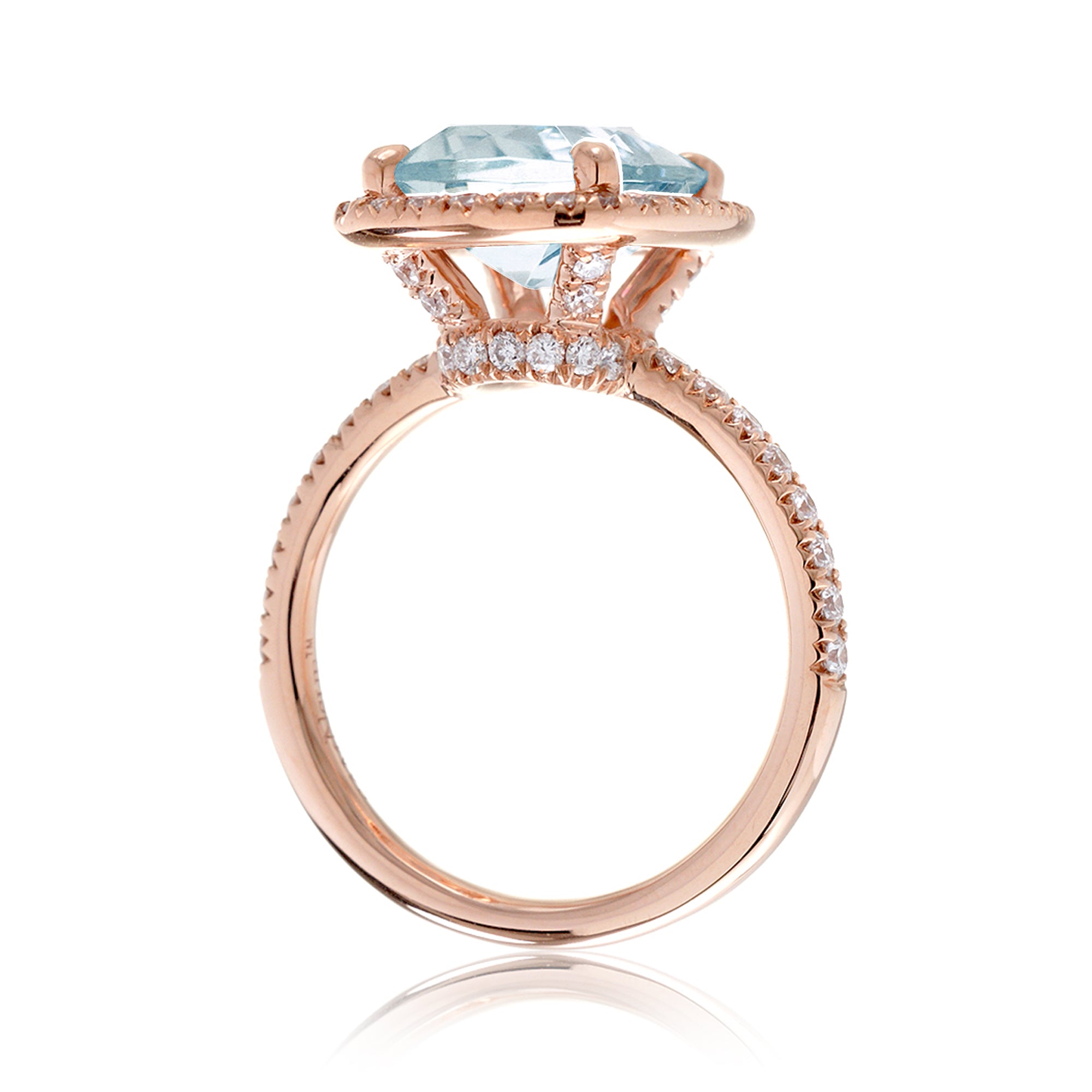 Cushion cut aquamarine ring with a diamond halo and comfort fit band the Drenched rose gold side view
