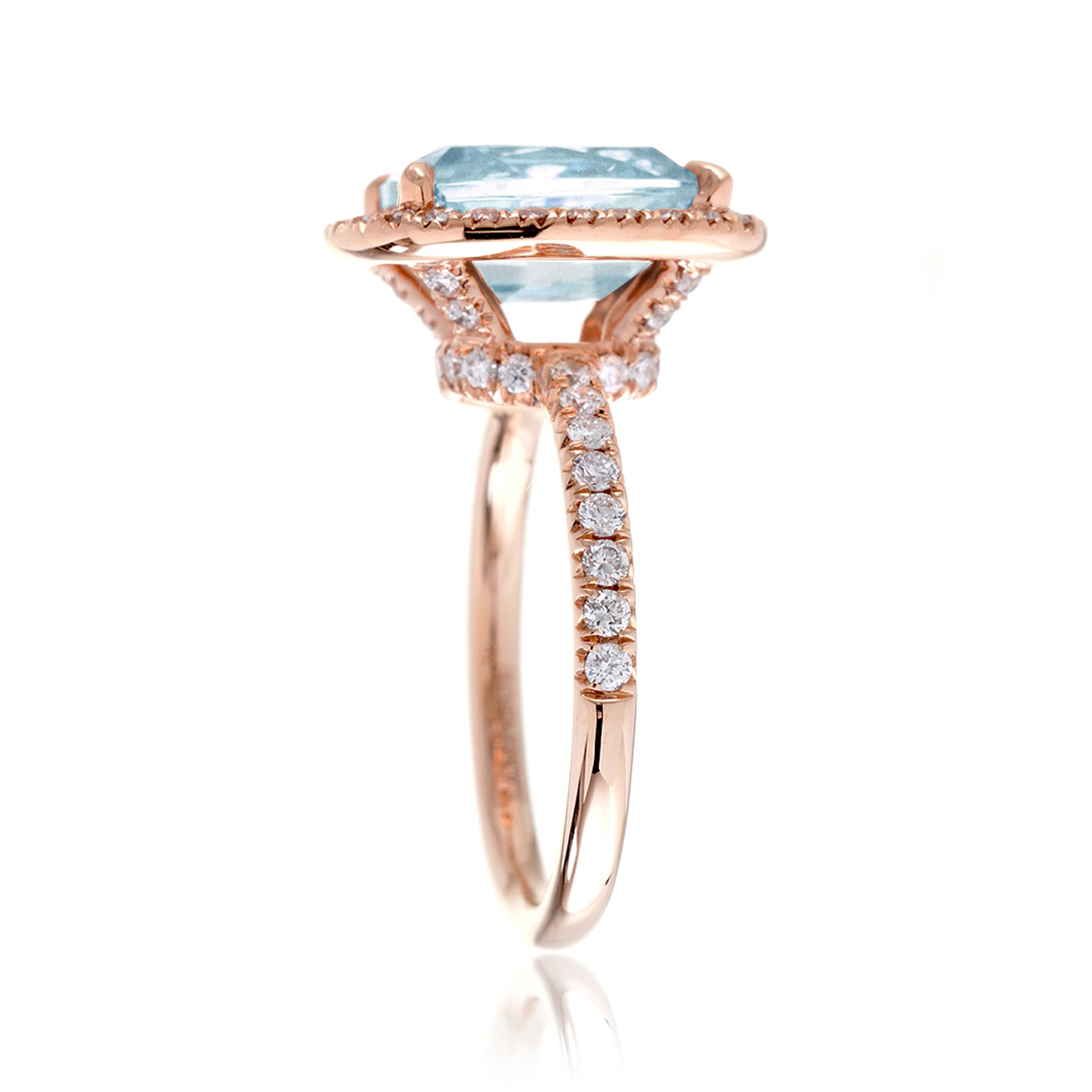 Cushion cut aquamarine ring with a diamond halo and comfort fit band the Drenched rose gold side profile