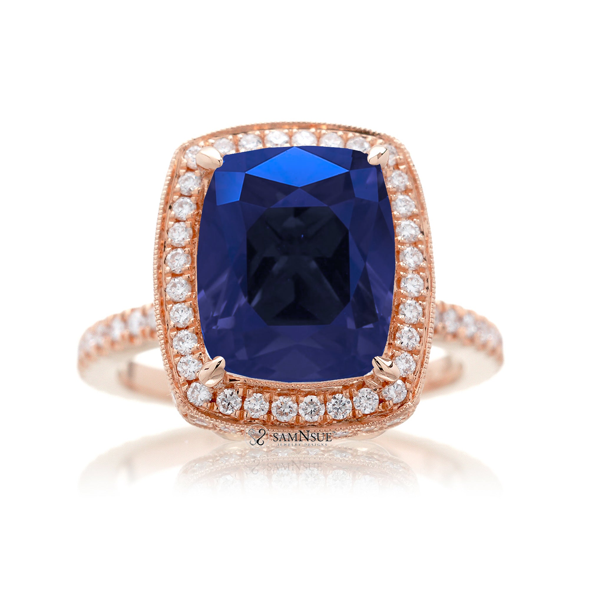 Cushion sapphire engagement ring with vintage scrolls and diamond accent rose gold