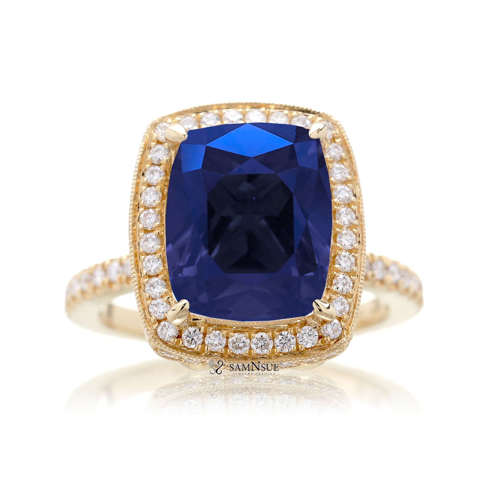 Cushion sapphire engagement ring with vintage scrolls and diamond accent yellow gold