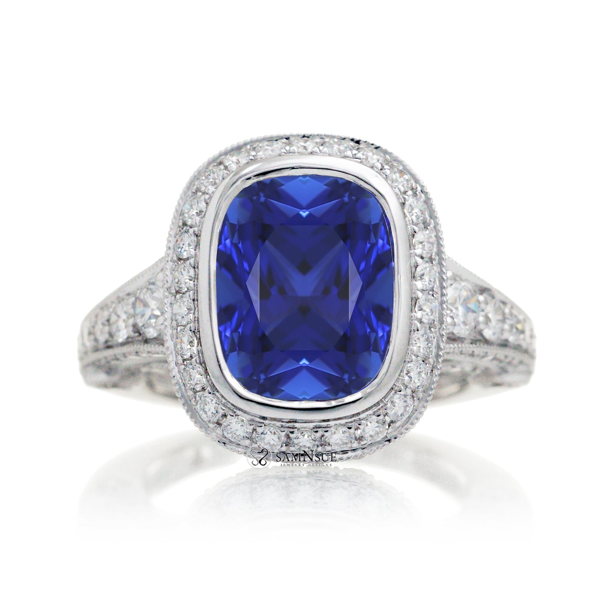 Cushion cut bezel blue sapphire diamond halo ring