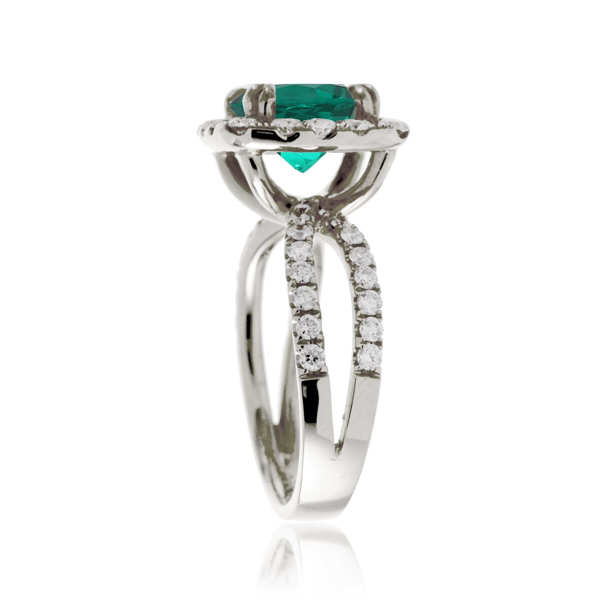 Cushion cut emerald diamond halo and split band in white gold