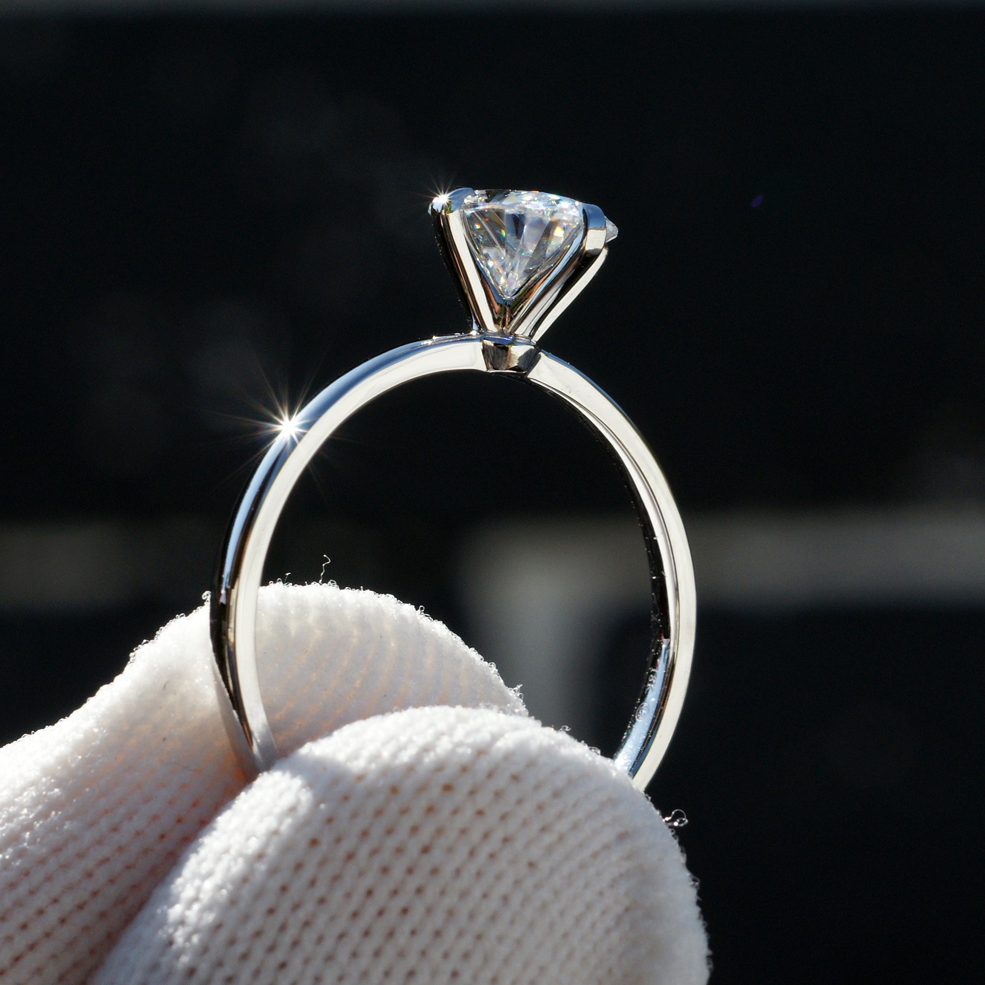 The Adeline Cushion Moissanite 8x6mm 18k white gold middle prongs