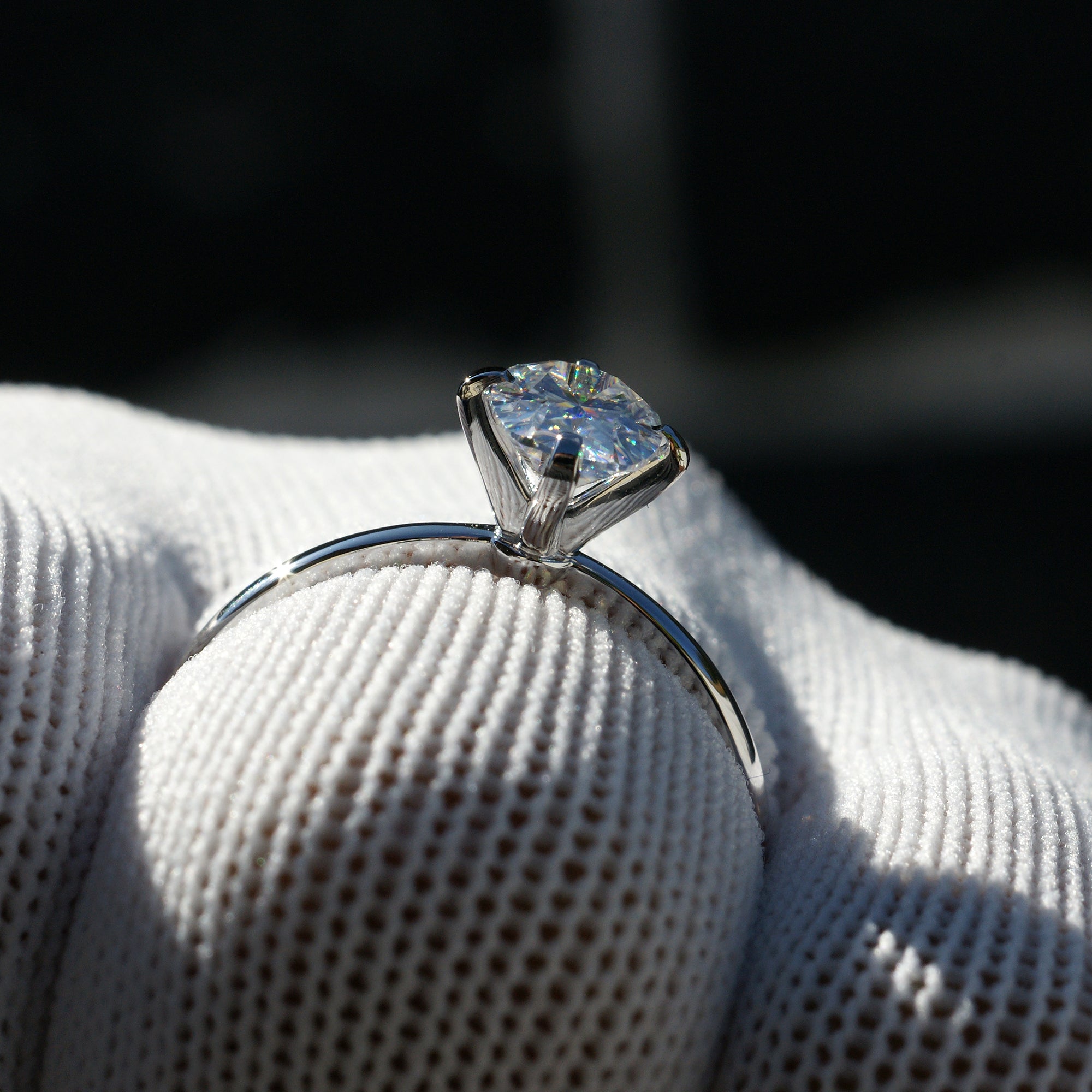 The Adeline Cushion Moissanite 8x6mm 18k white gold middle prongs