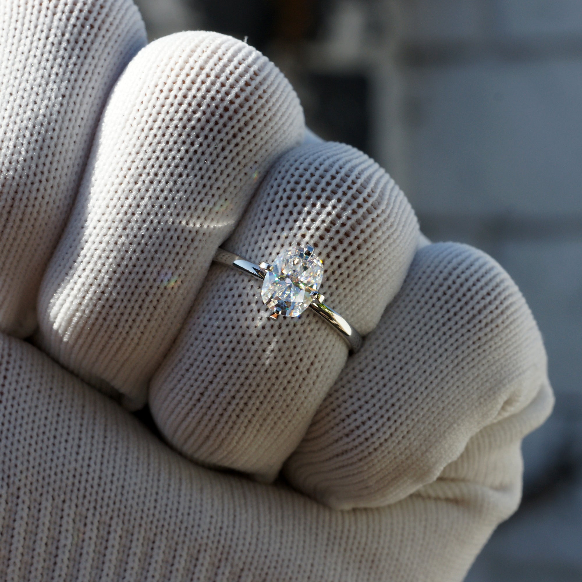 The Adeline Cushion Moissanite 8x6mm 18k white gold middle prongs