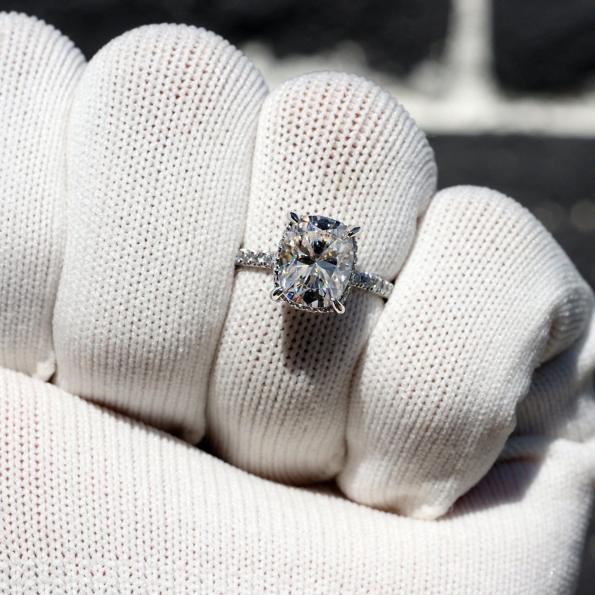 The Drenched Solitaire Cushion Moissanite Ring 10x8 Platinum