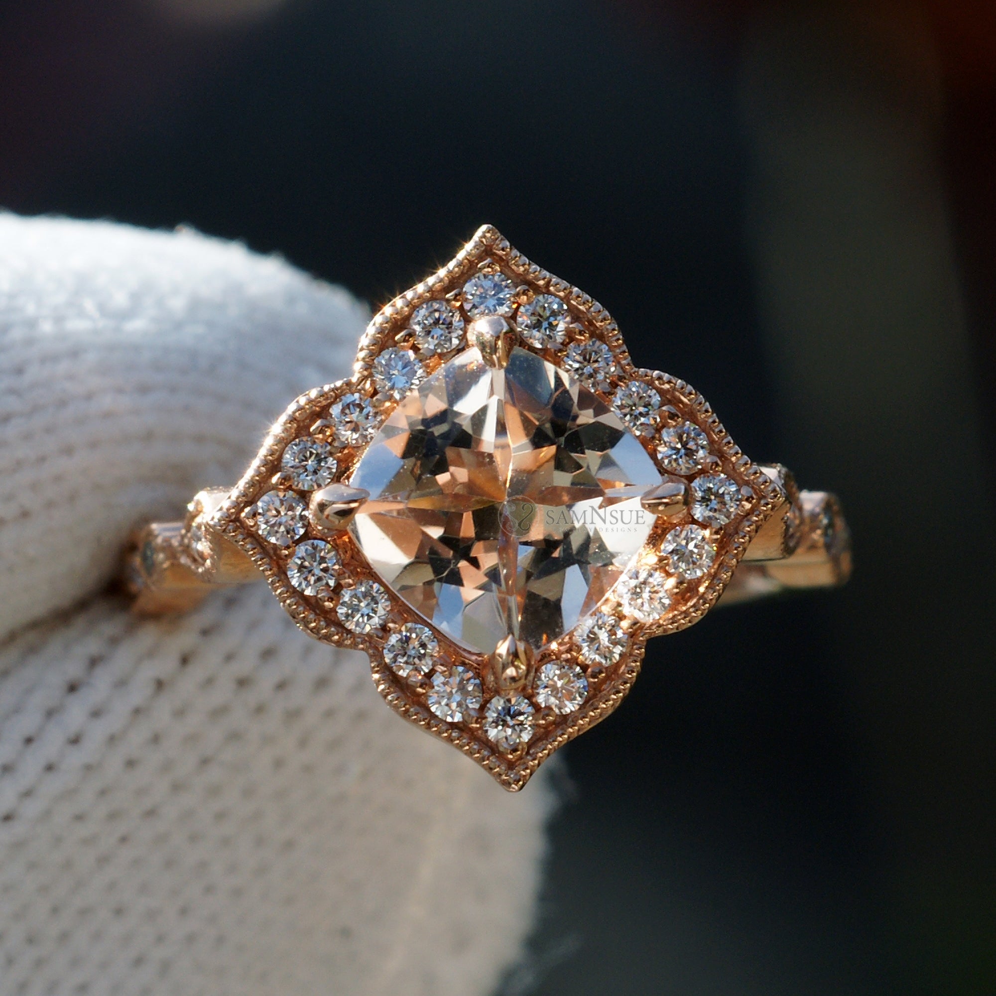 Cushion morganite ring in rose gold with a diamond halo