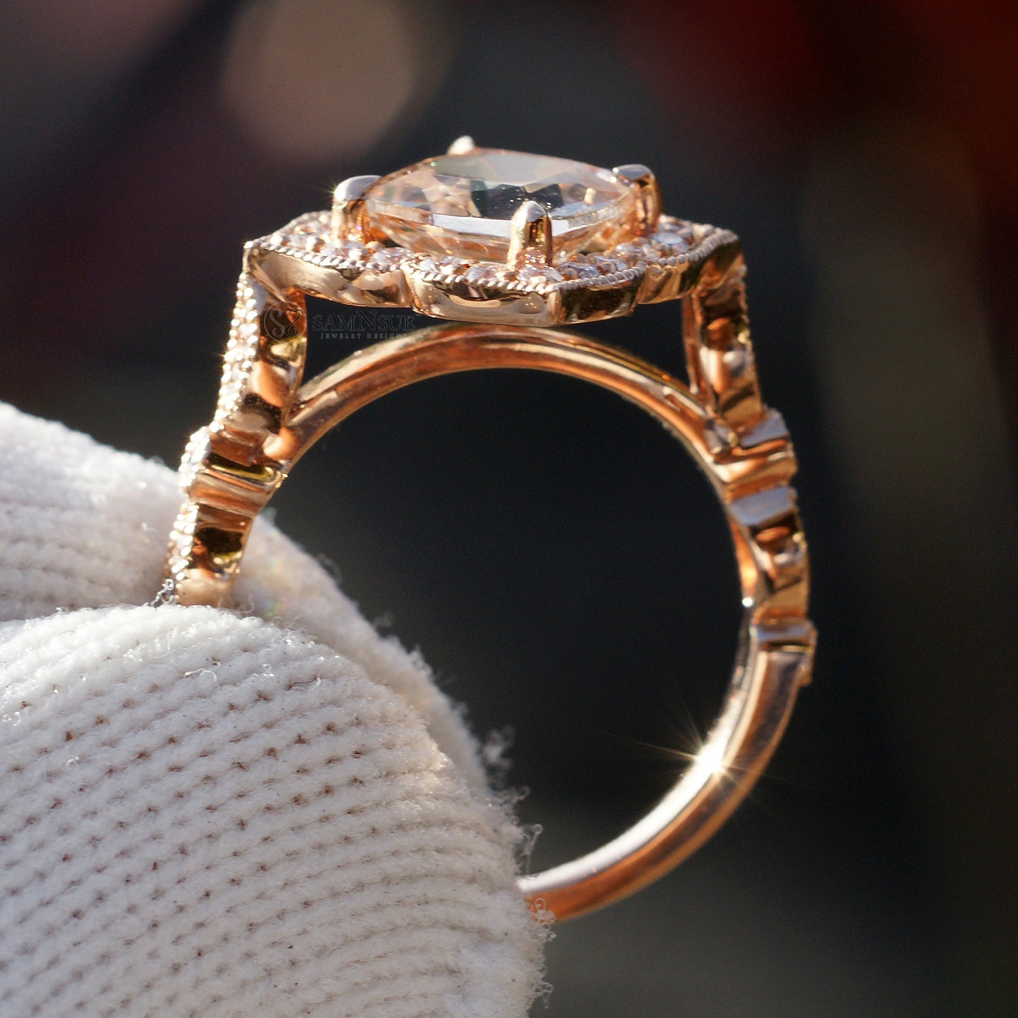 Cushion morganite ring in rose gold with a diamond halo