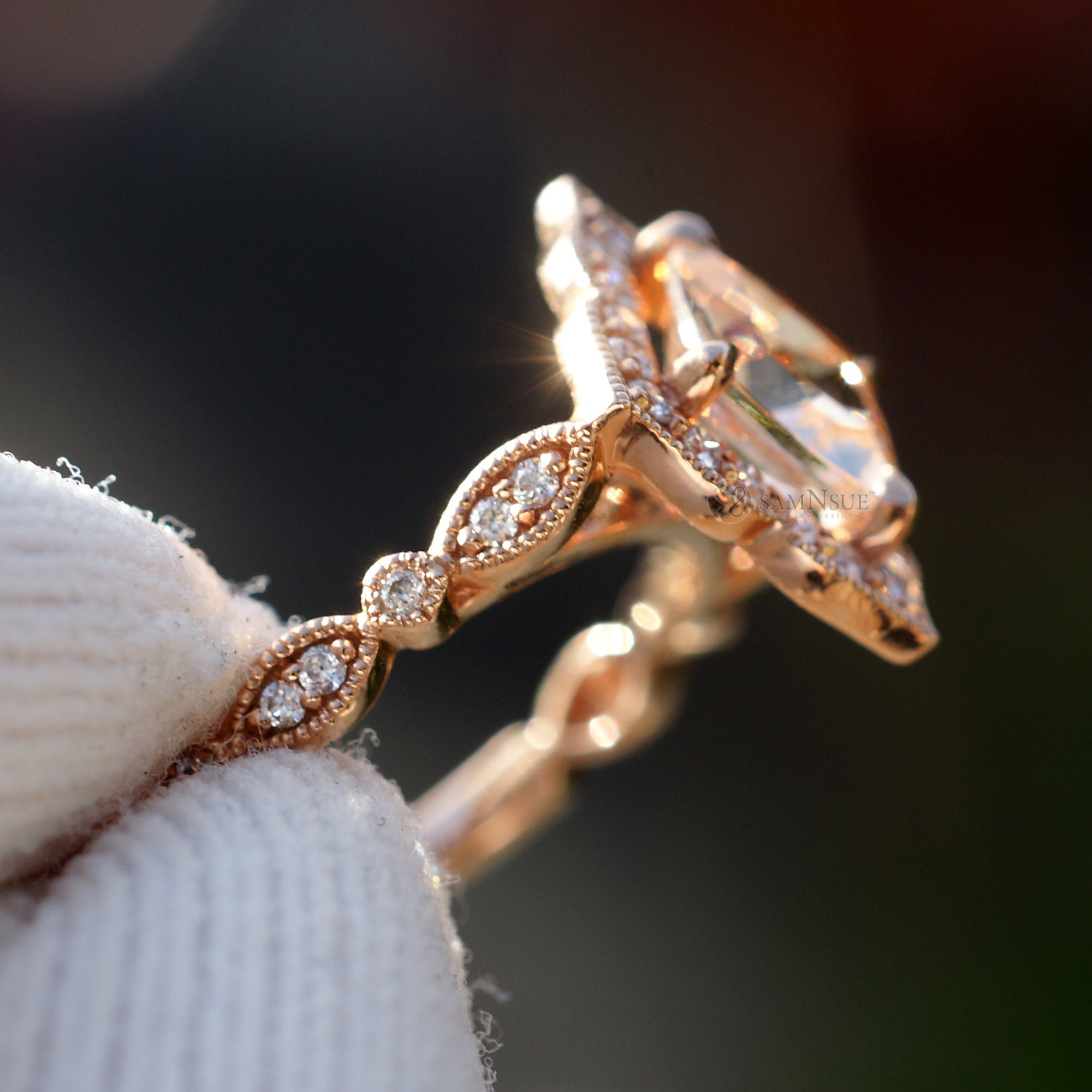 Cushion morganite ring in rose gold with a diamond halo