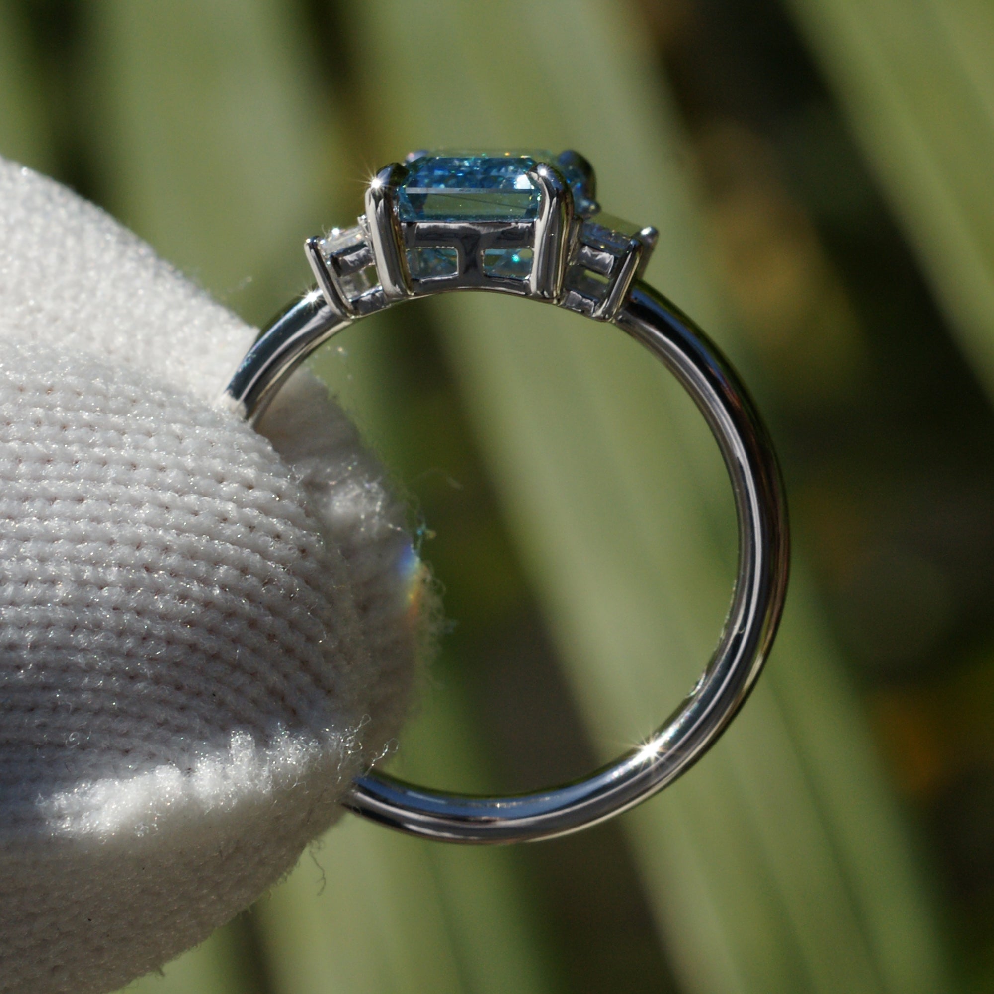 Fancy blue diamond engagement three stone long baguette ring in platinum 2ct to 3ct