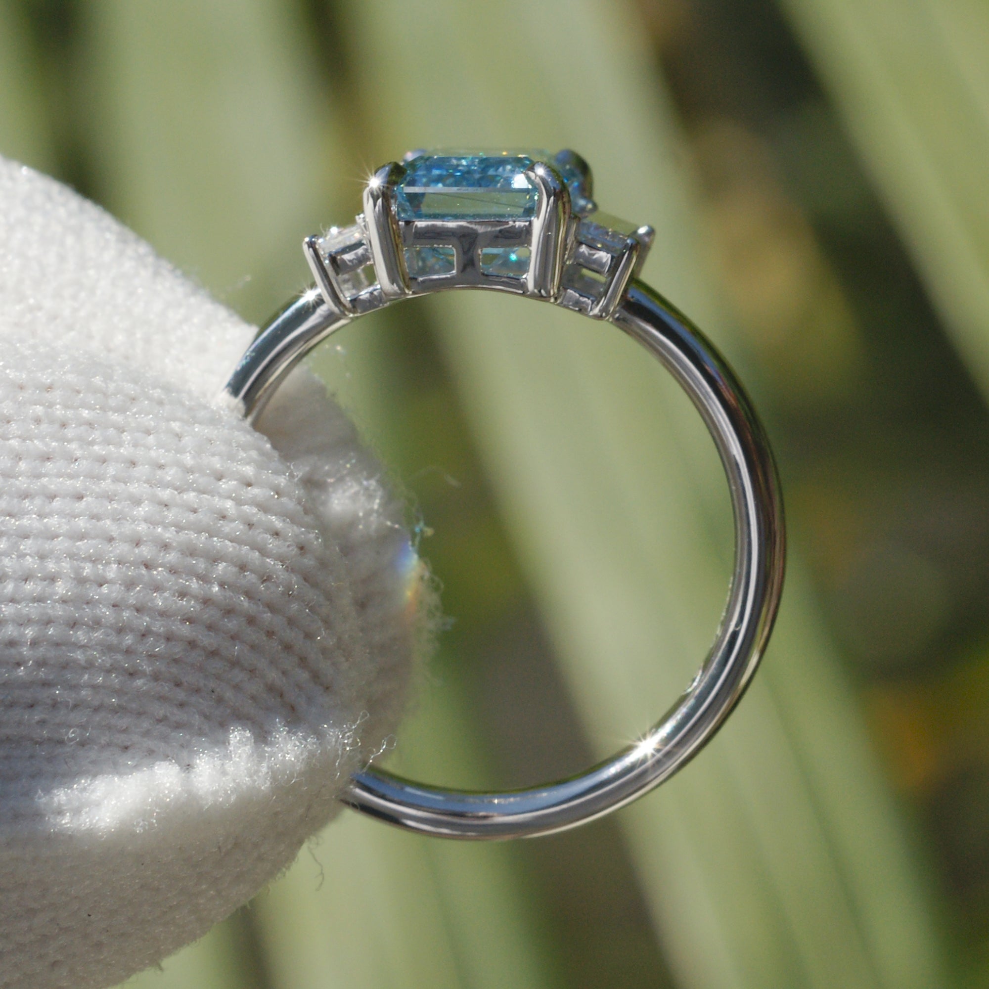 Fancy blue diamond engagement three stone long baguette ring in platinum 2ct to 3ct