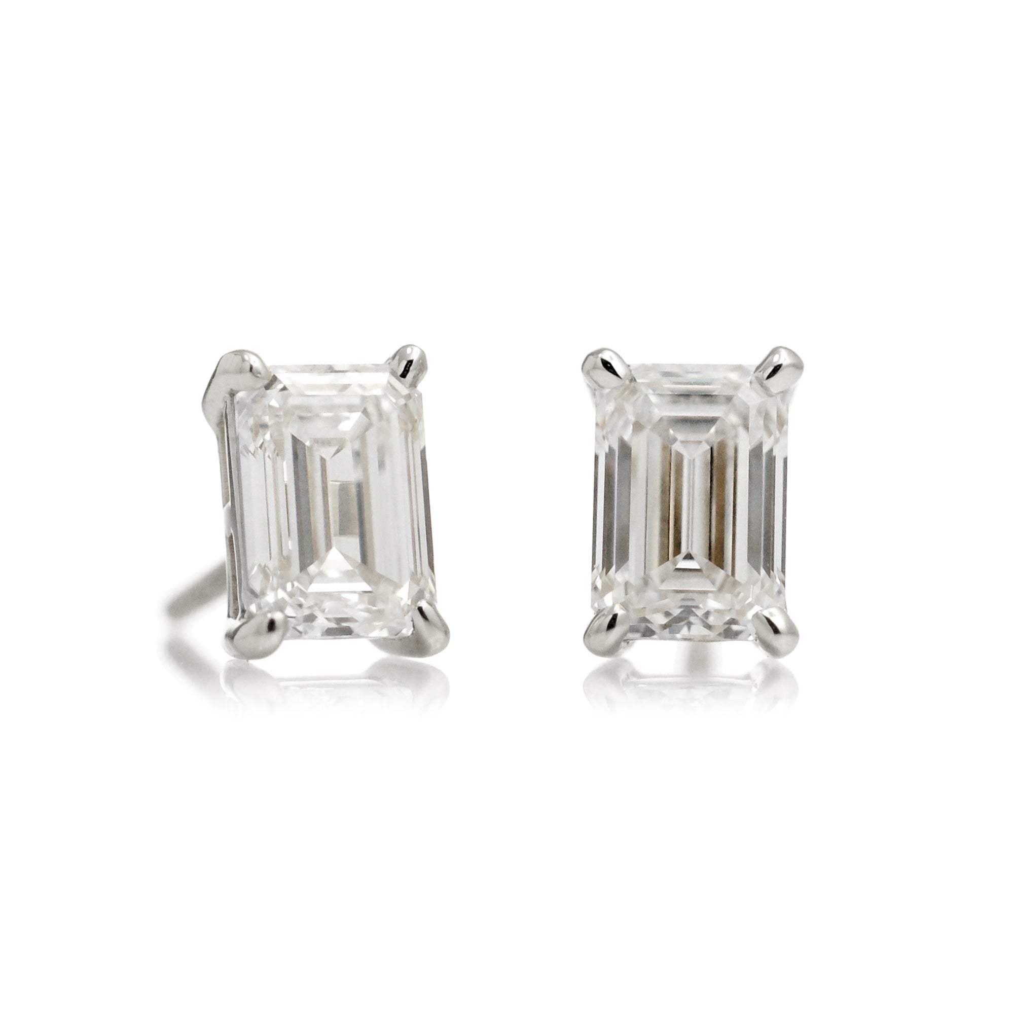 Diamond earrings emerald cut studs white gold