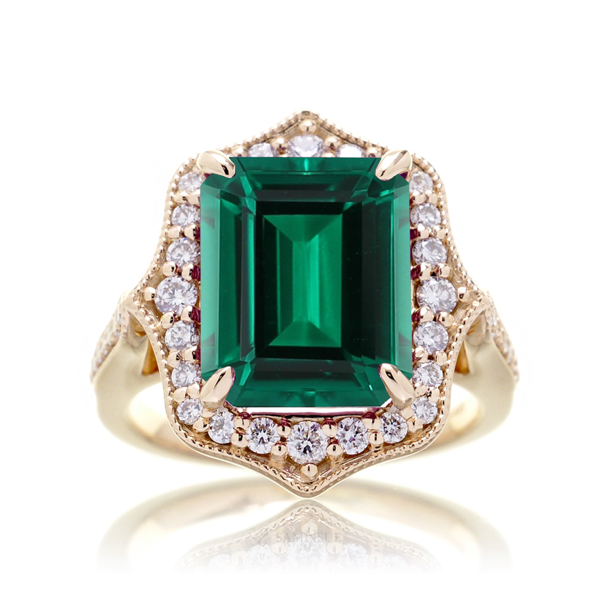 Vintage Emerald and Diamond Halo Ring in Yellow Gold
