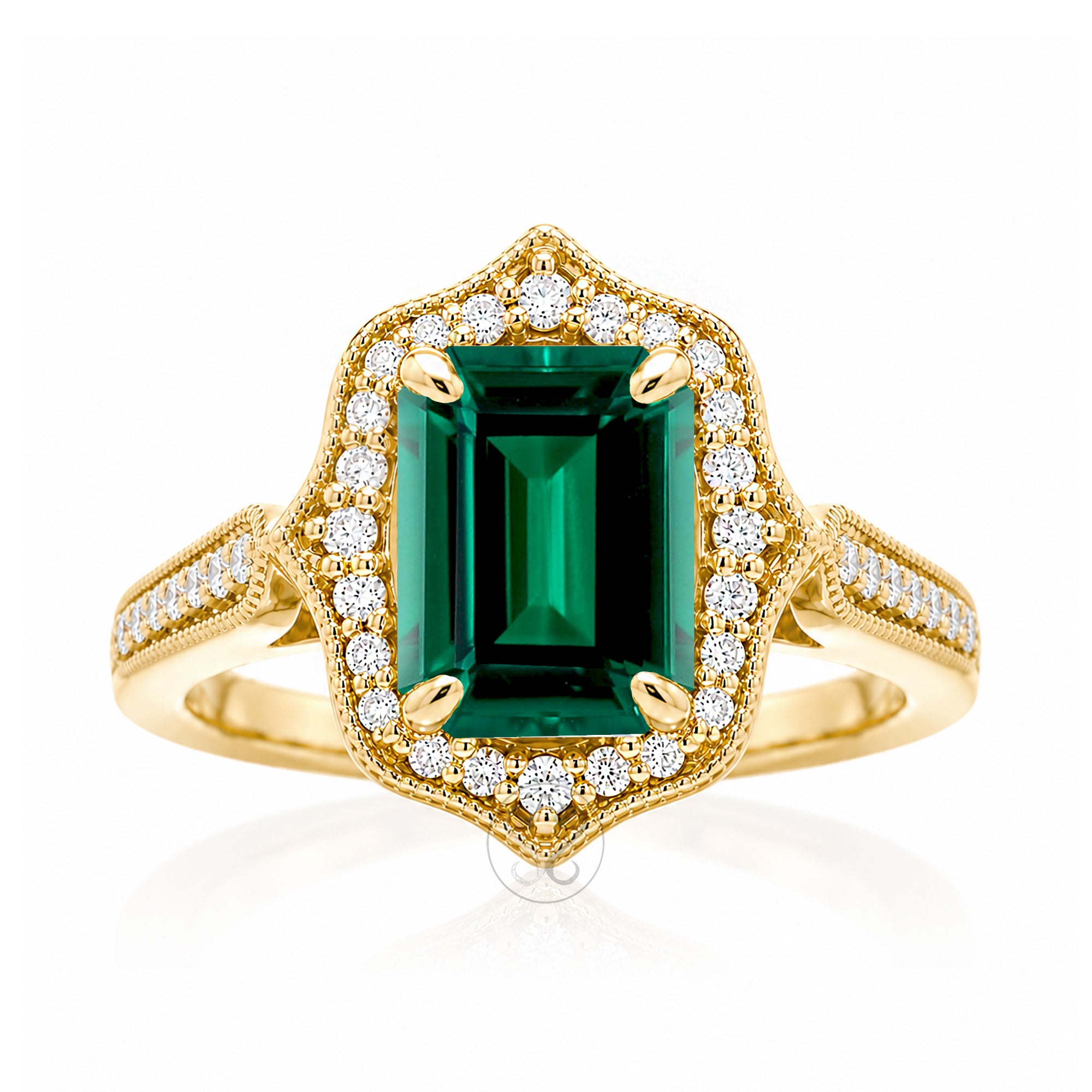 Vintage Emerald and Diamond Halo Ring in Yellow Gold
