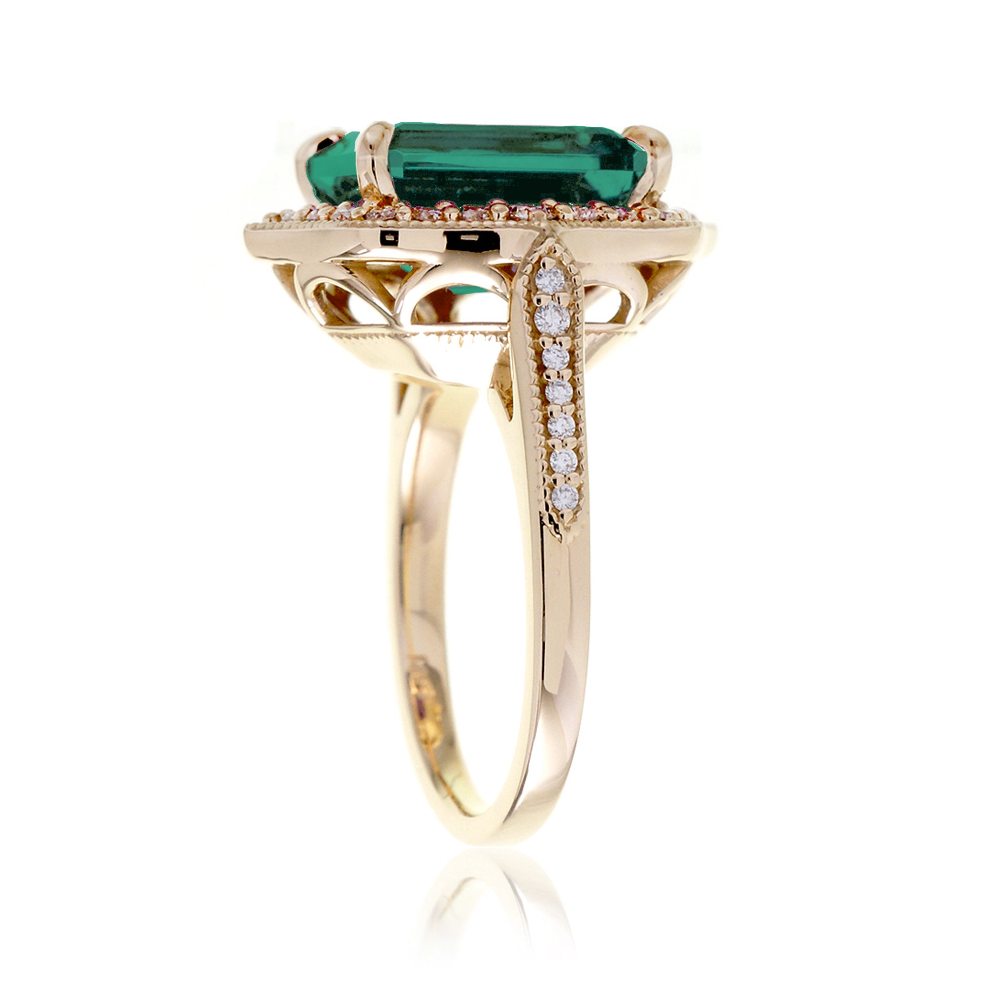 Vintage Emerald and Diamond Halo Ring in Yellow Gold