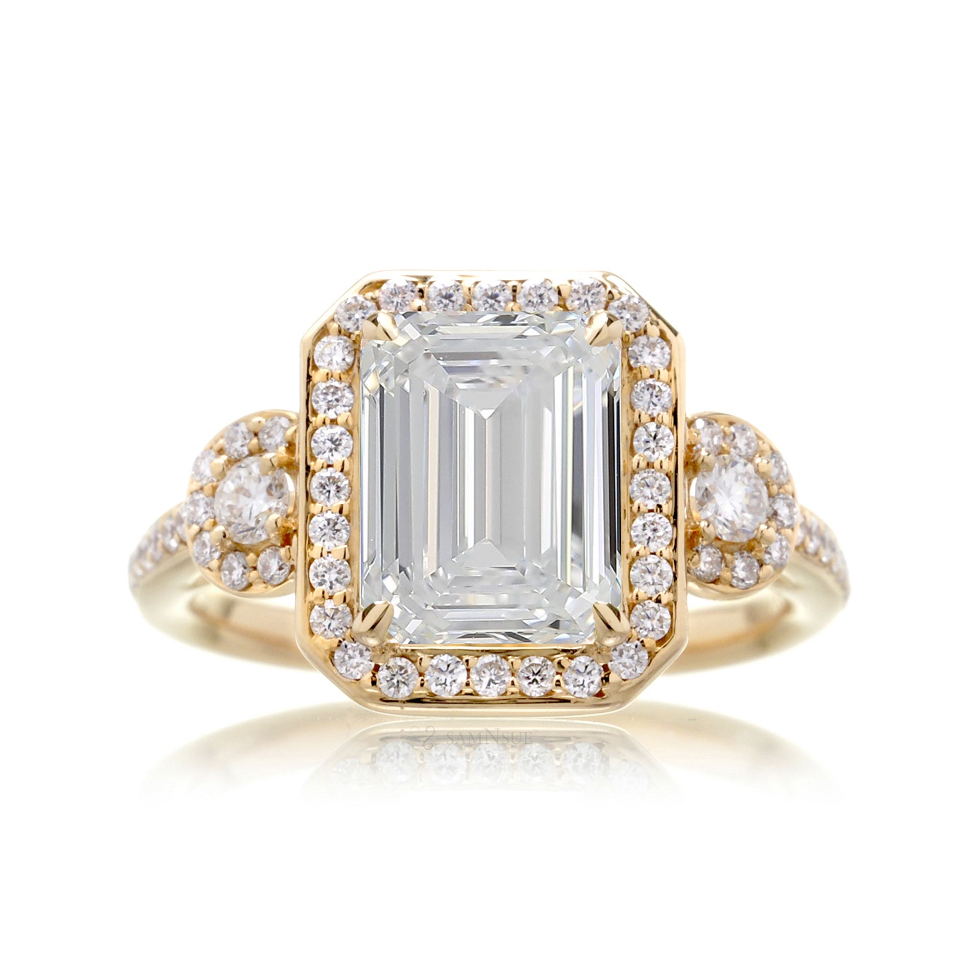 Elegant Emerald Cut Diamond Ring with Halo Setting