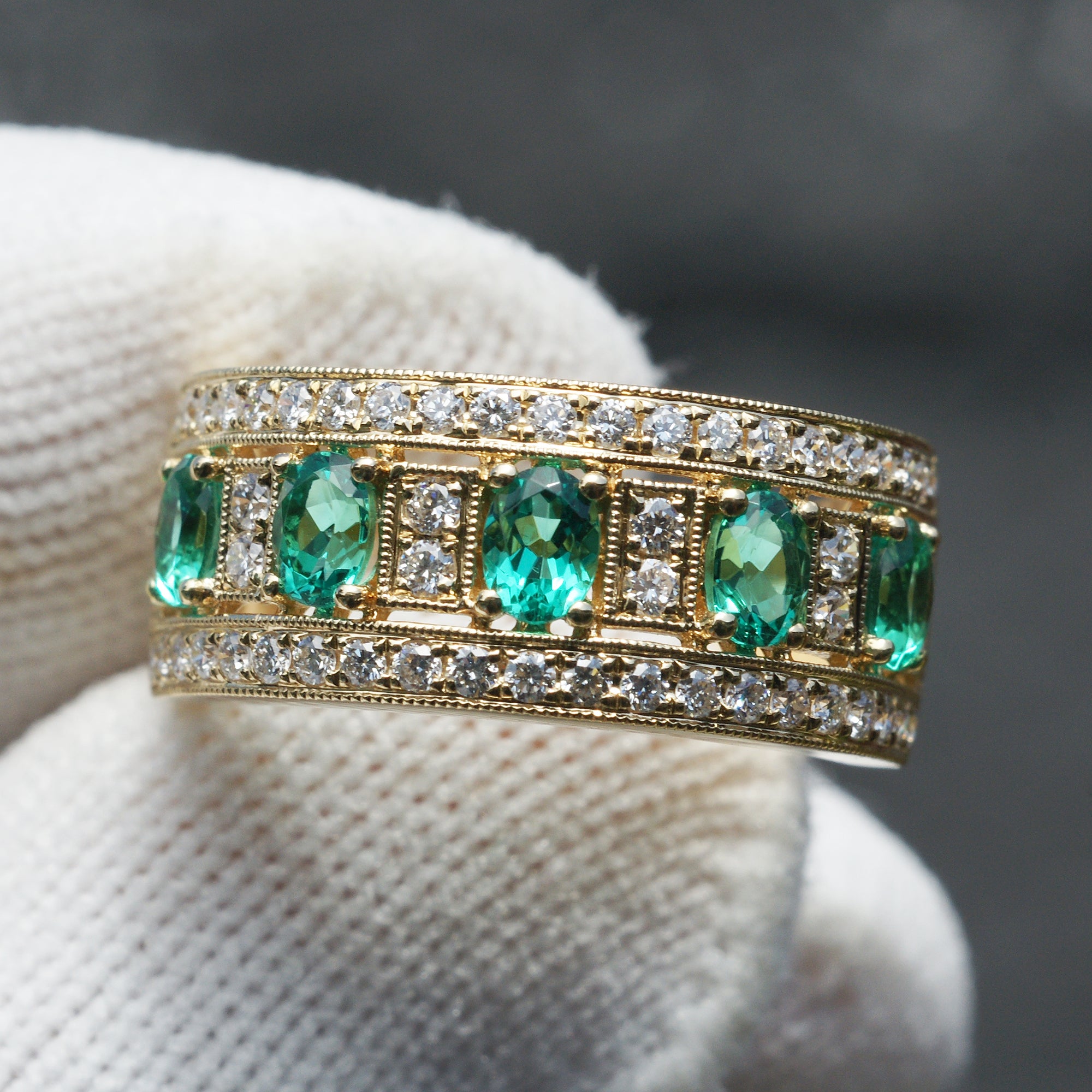 The Marjorie Oval Emerald Diamond Anniversary Wedding Band