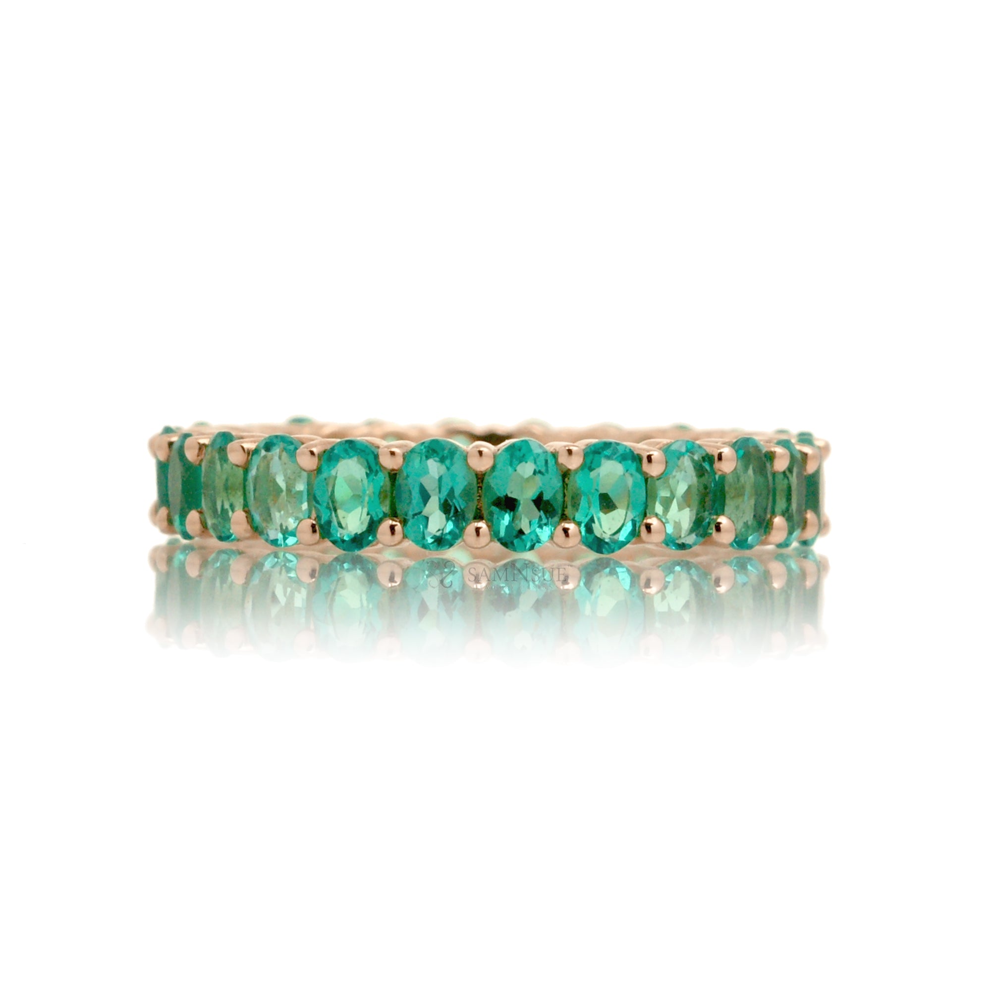 Emerald oval cut eternity band rose gold