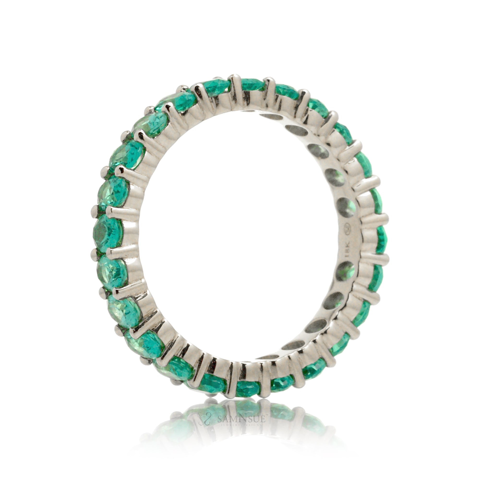 Emerald oval cut eternity band white gold