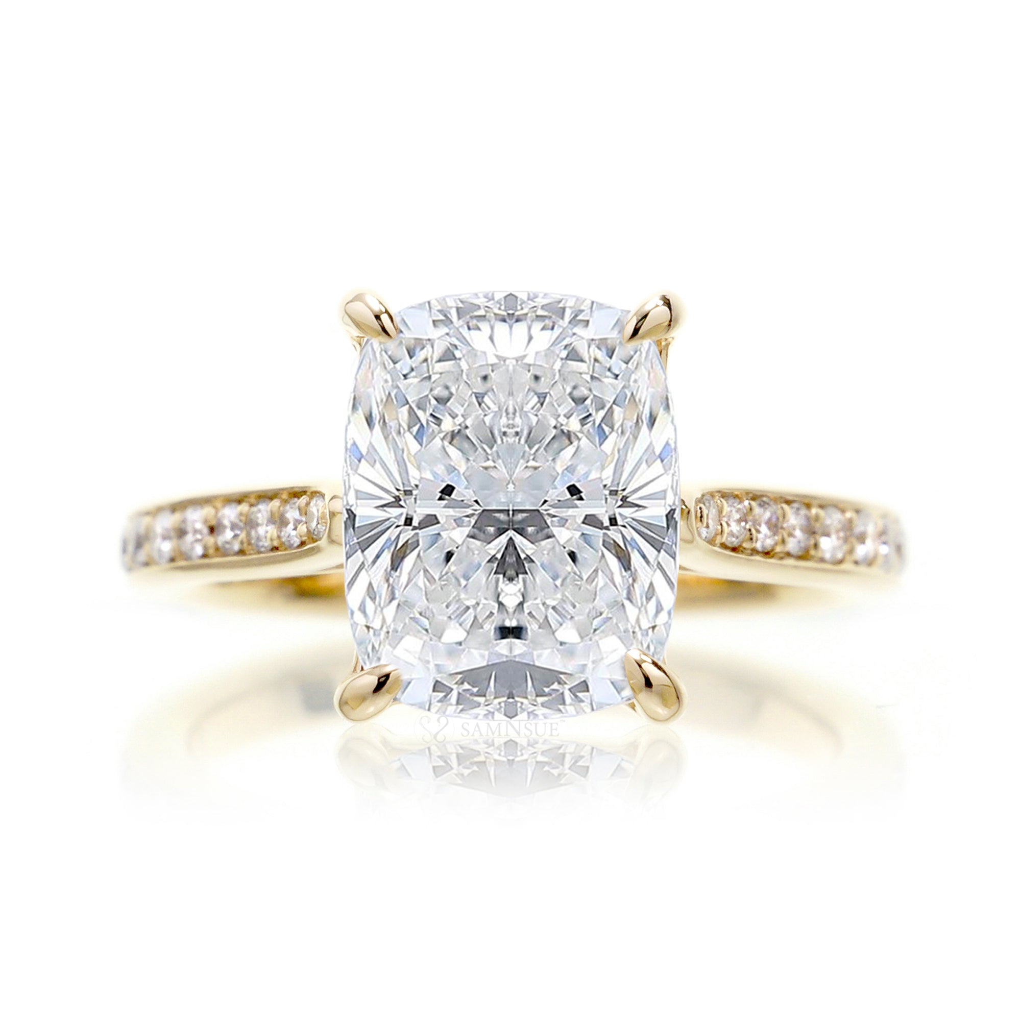 Cushion diamond solitaire engagement ring with diamond band in yellow gold
